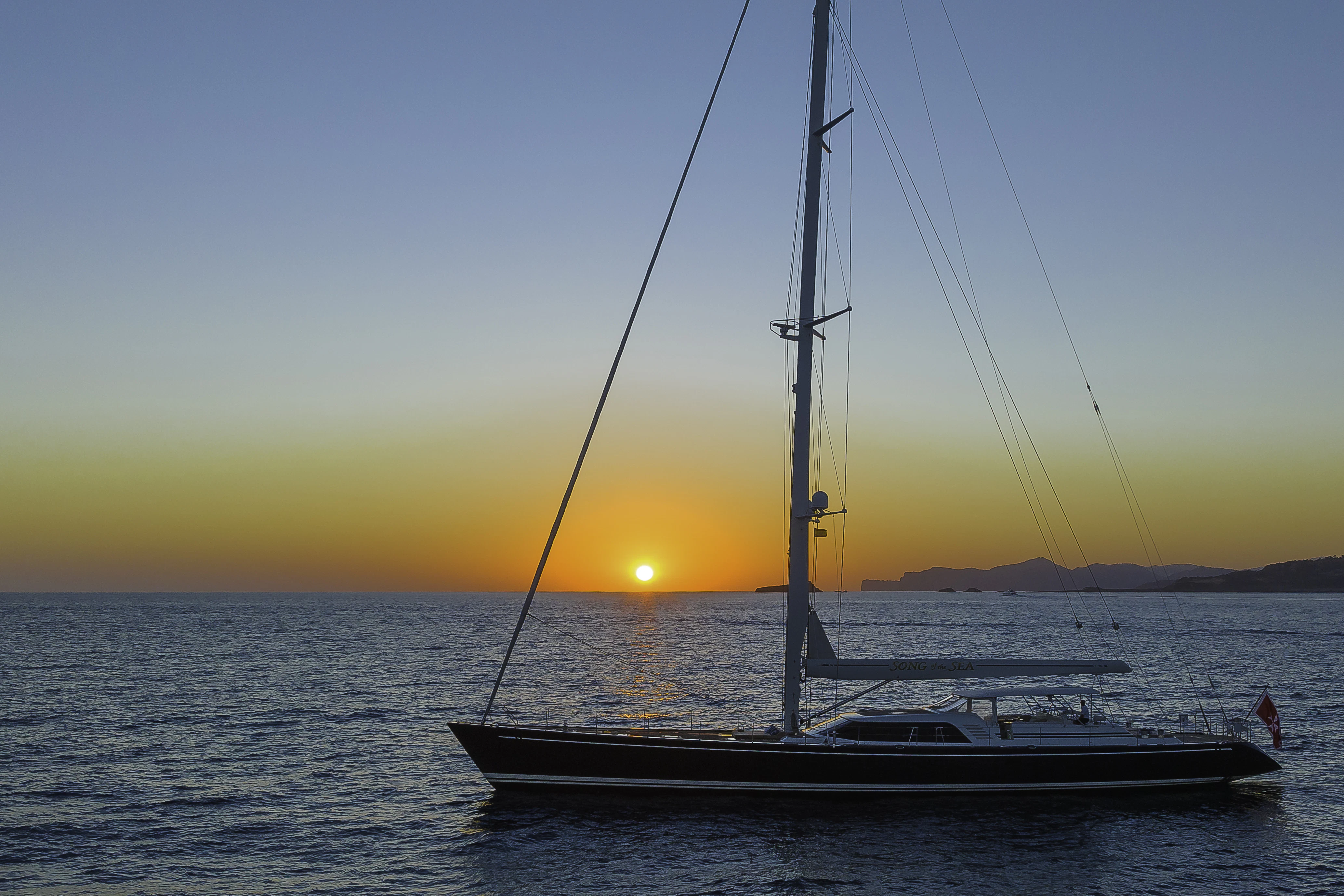 a sailboat in the water aboard SONG OF THE SEA Yacht for Sale