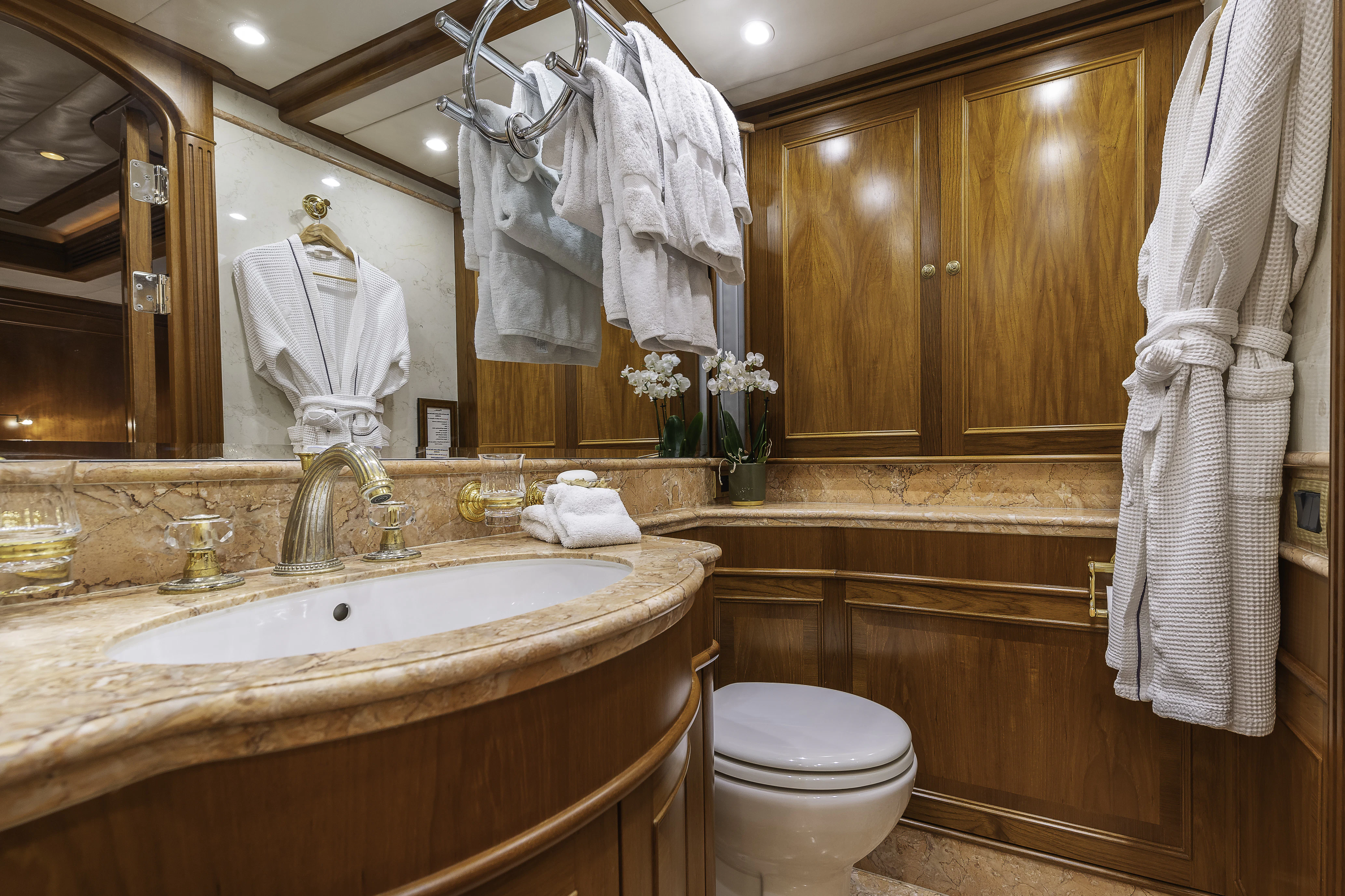 a bathroom with a sink toilet and bathtub aboard SONG OF THE SEA Yacht for Sale