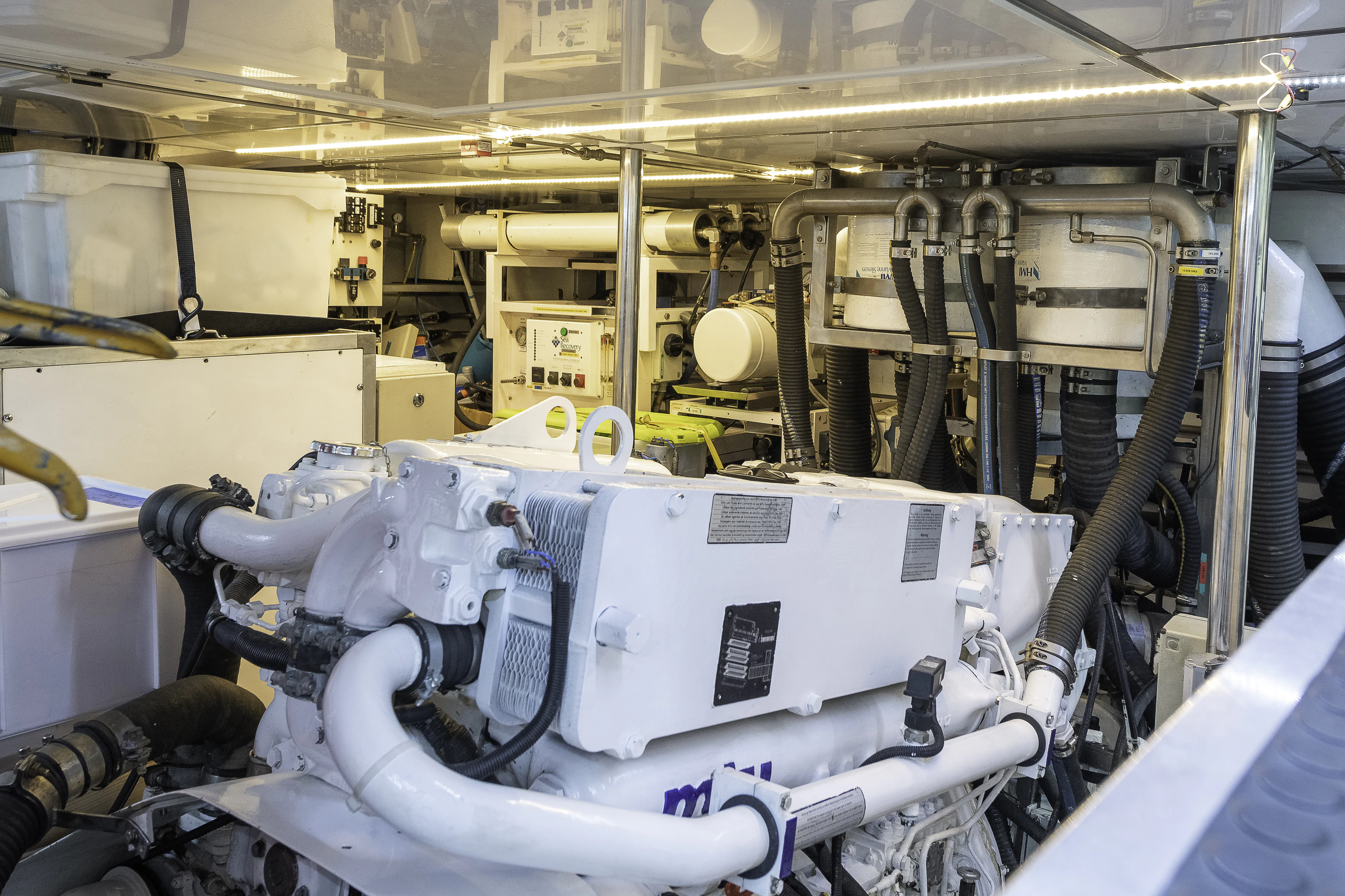 a machine with a large piece of equipment in it aboard SONG OF THE SEA Yacht for Sale