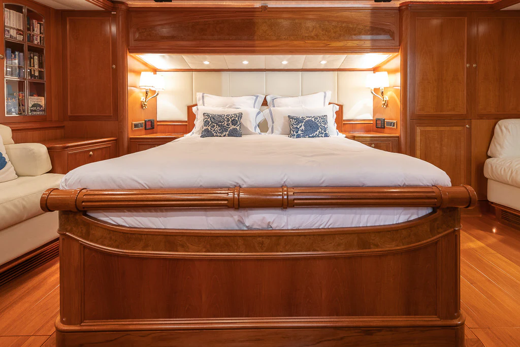 a bed in a room aboard SONG OF THE SEA Yacht for Sale