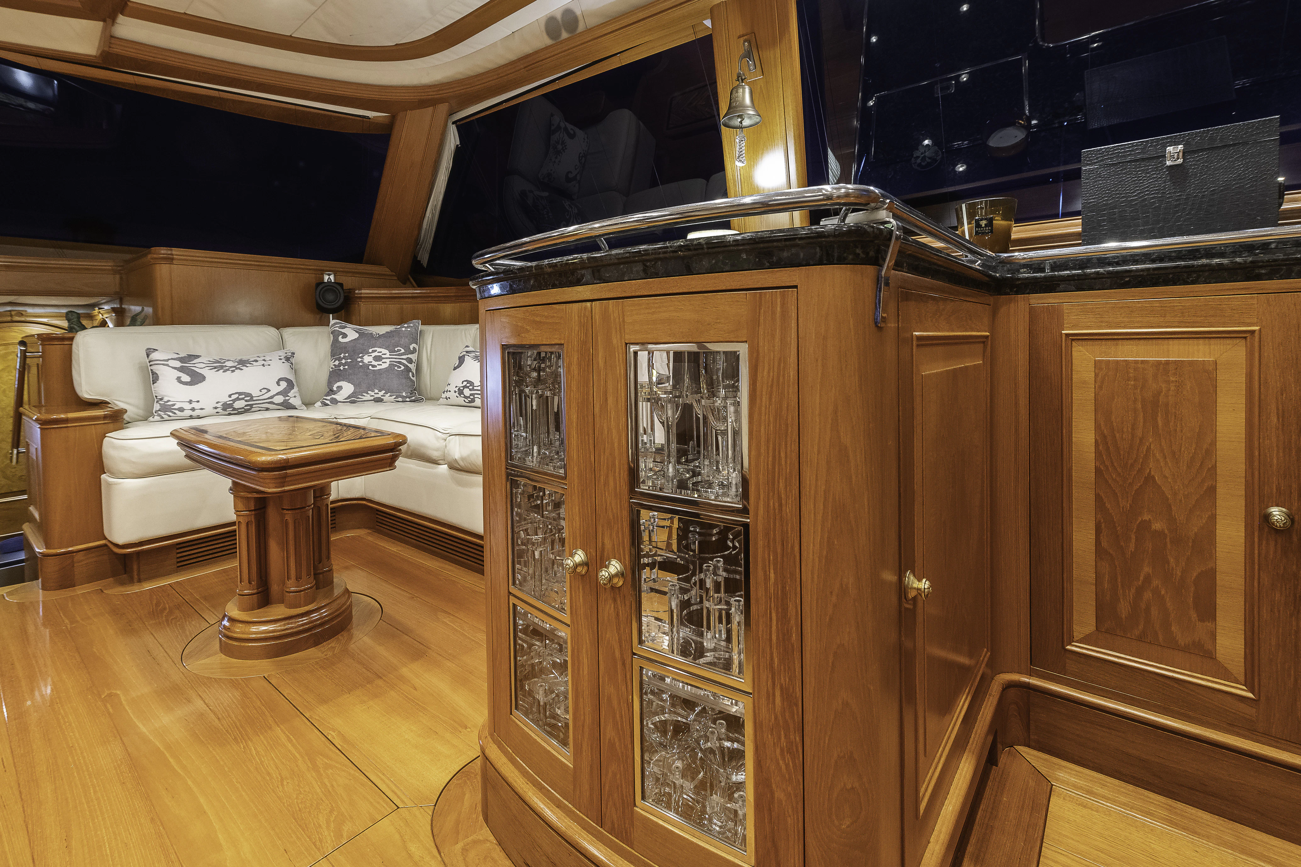 a room with a bed and a table aboard SONG OF THE SEA Yacht for Sale