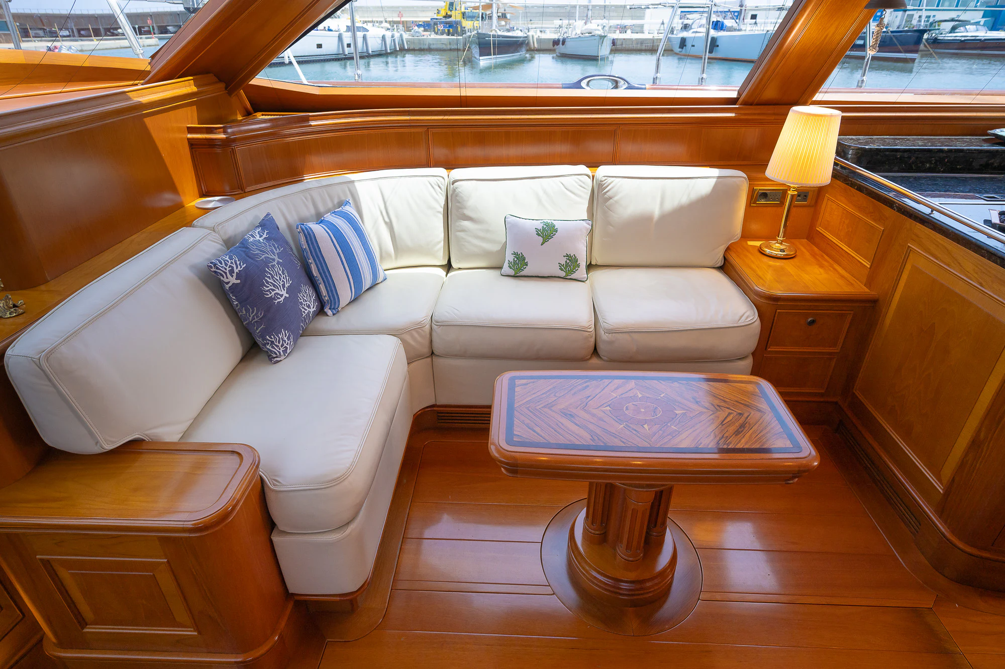 a room with a couch and a table aboard SONG OF THE SEA Yacht for Sale