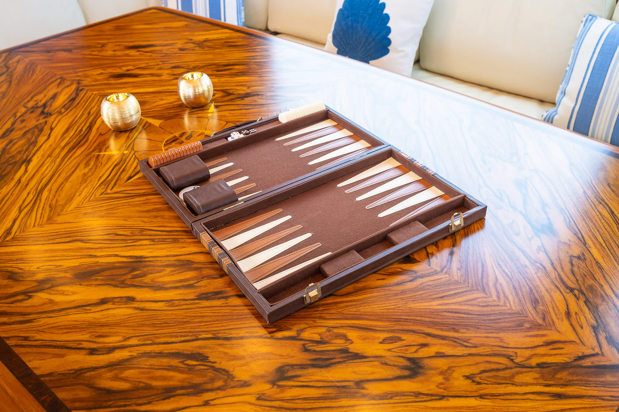 a black and white electronic device on a table aboard SONG OF THE SEA Yacht for Sale