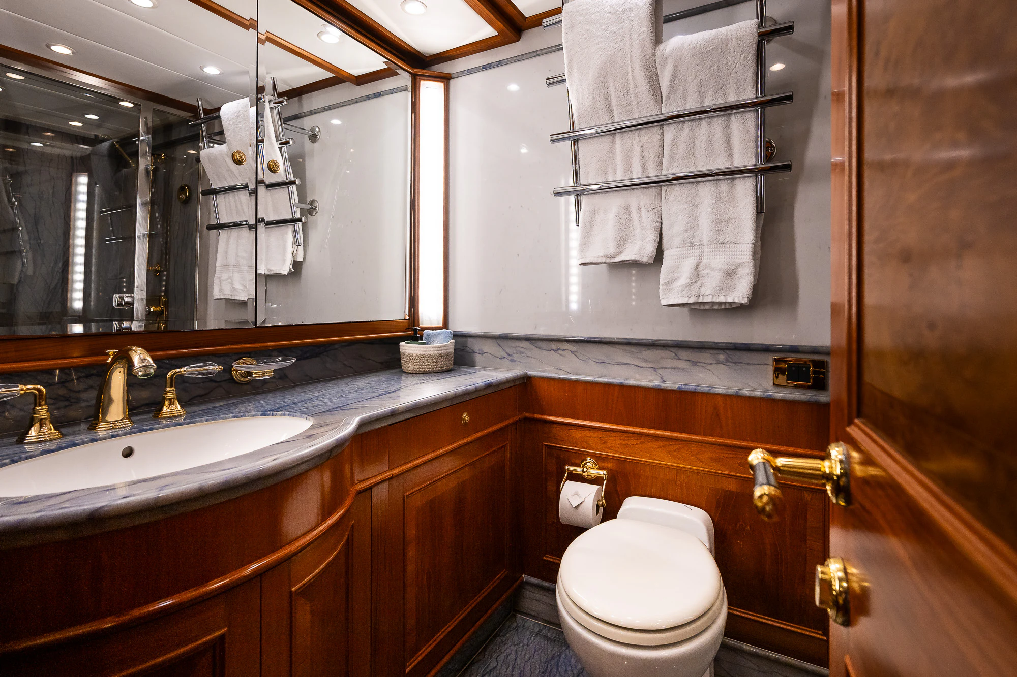 a bathroom with a sink and toilet aboard SONG OF THE SEA Yacht for Sale