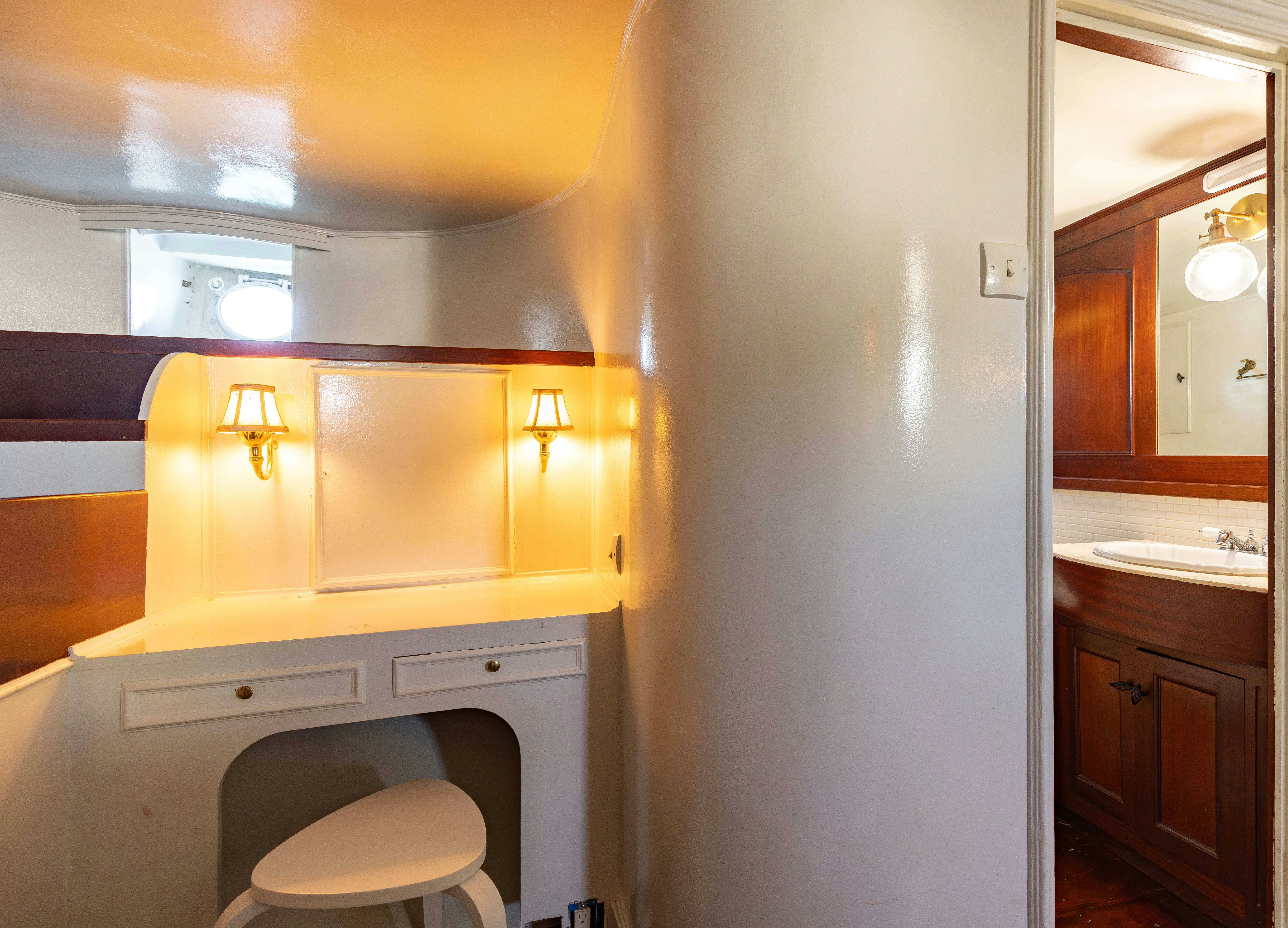 a room with a desk and a mirror aboard NORTHWIND Yacht for Sale