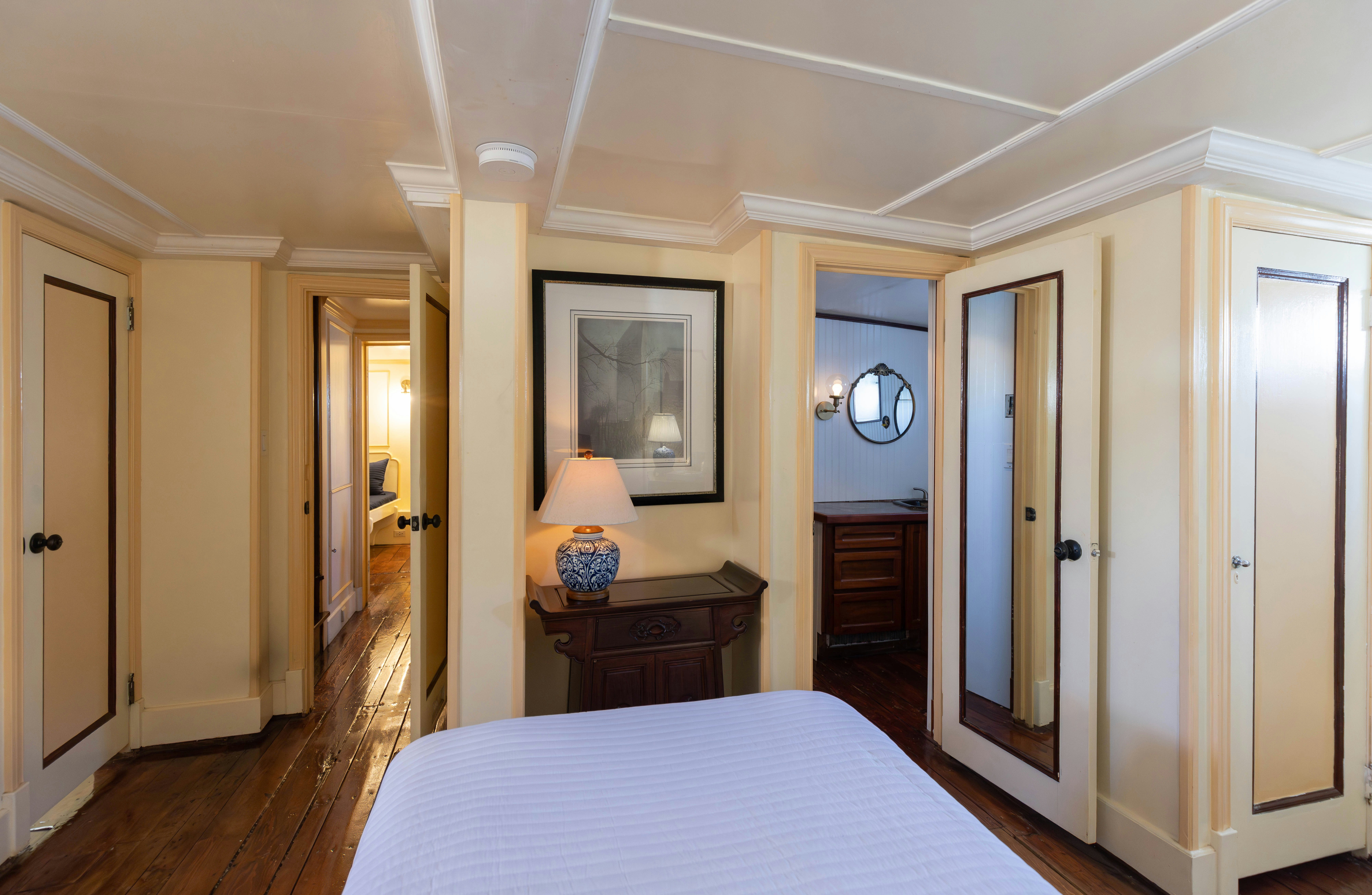 a bedroom with a bed and a desk aboard NORTHWIND Yacht for Sale