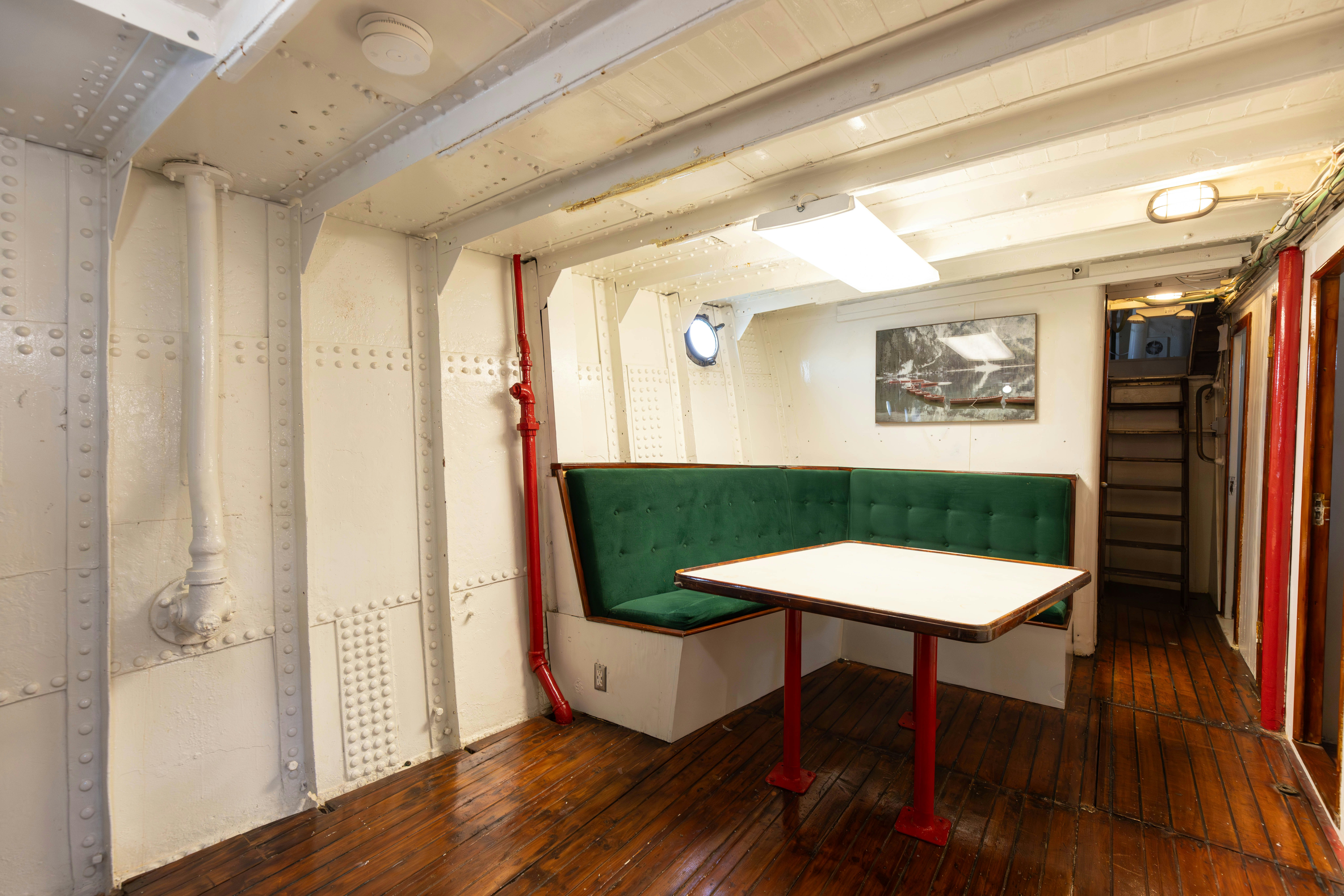 a room with a table and chairs aboard NORTHWIND Yacht for Sale