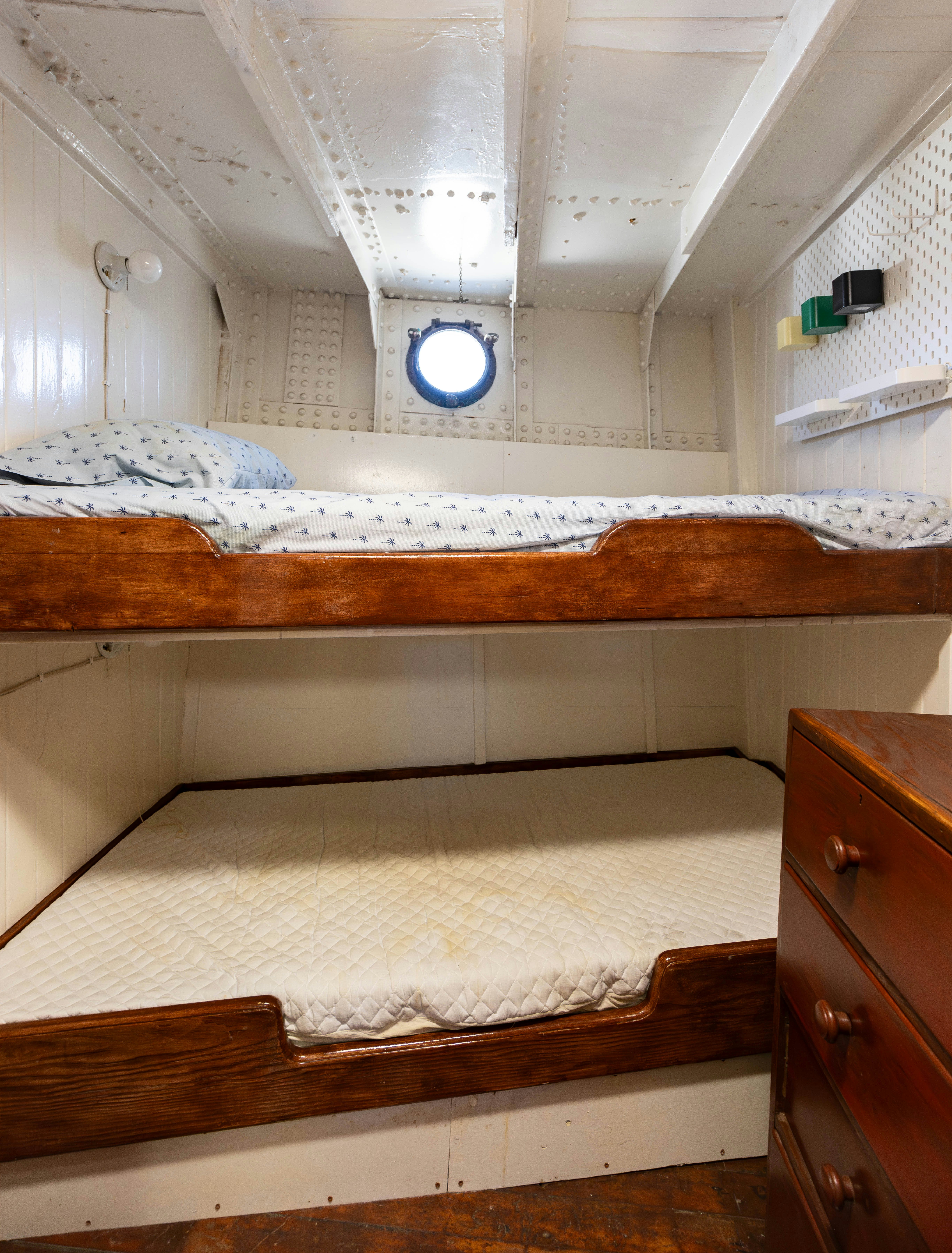 a room with a bed and a window aboard NORTHWIND Yacht for Sale