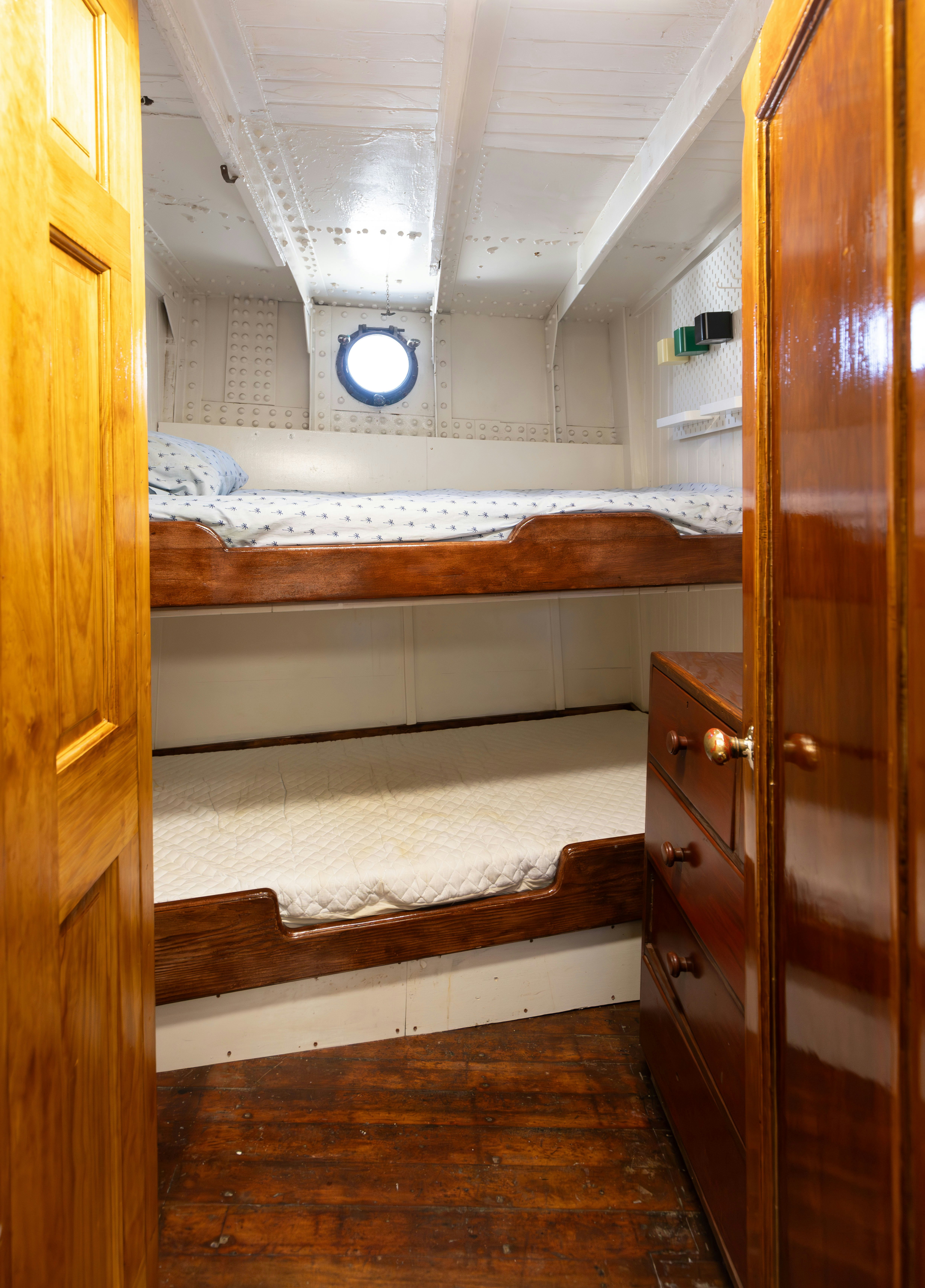 a bathroom with a large wooden closet aboard NORTHWIND Yacht for Sale
