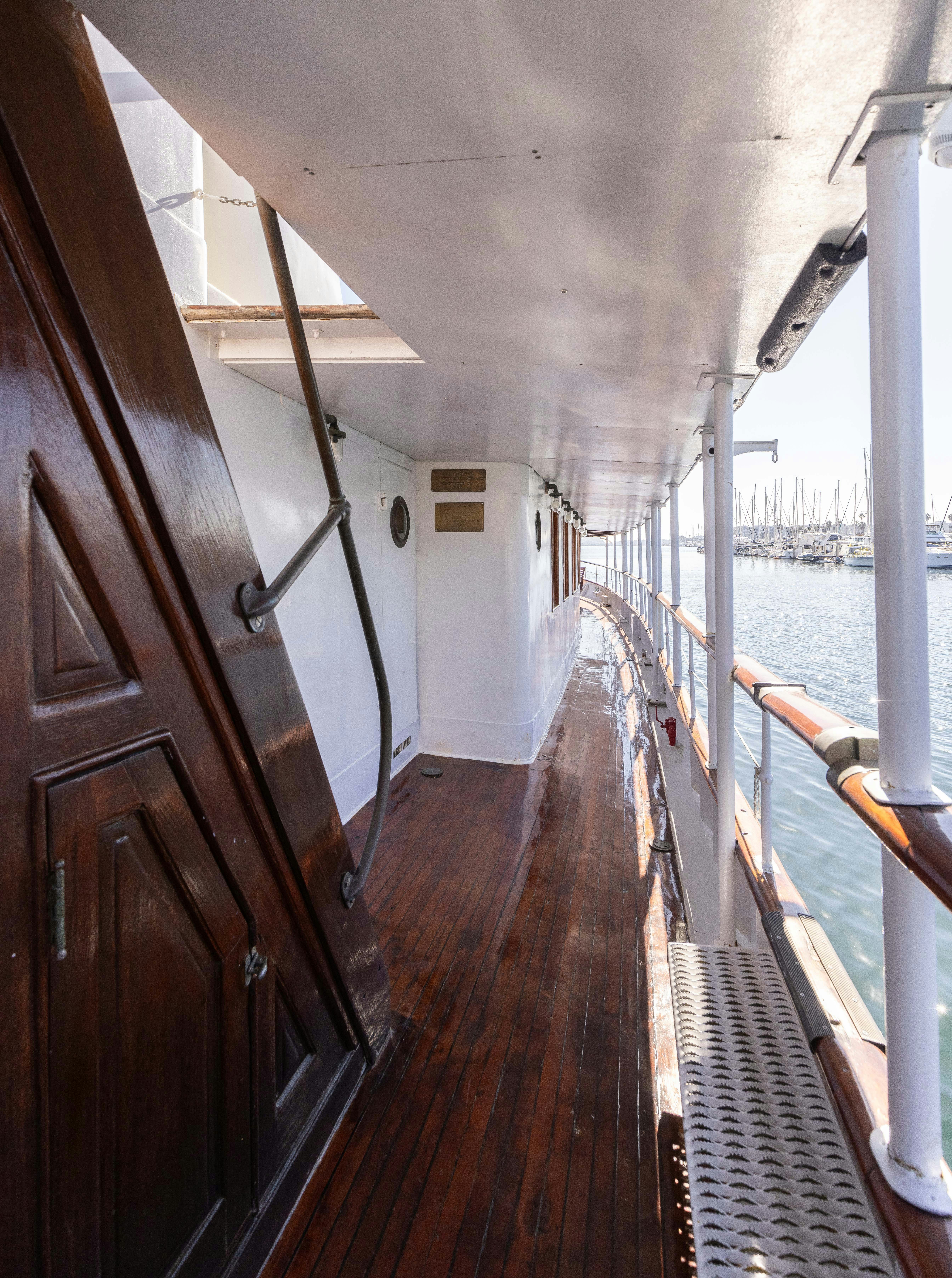 a wooden boat on a body of water aboard NORTHWIND Yacht for Sale