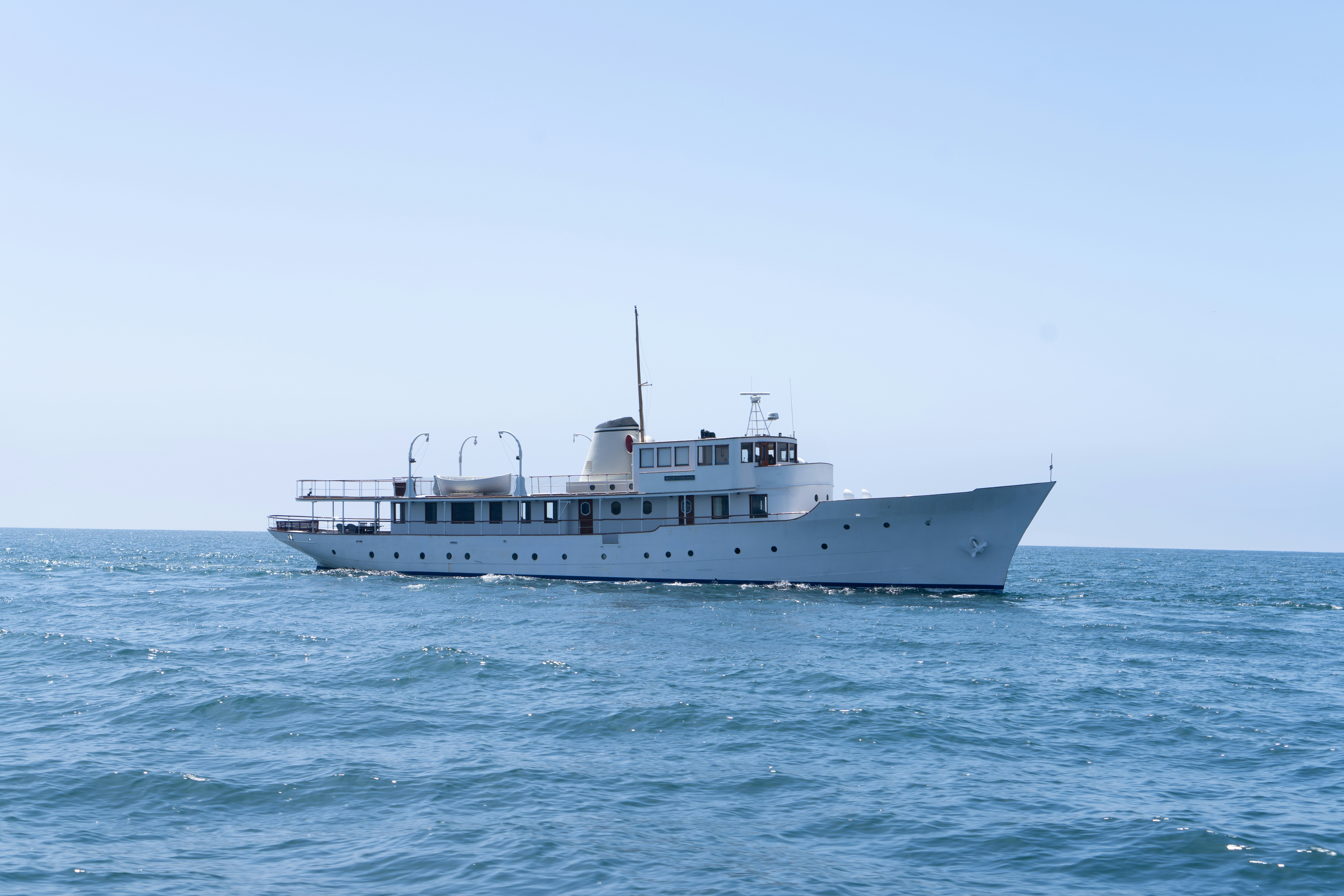 a large white boat in the water aboard NORTHWIND Yacht for Sale