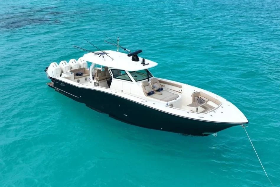 a boat in the water aboard SCOUT 400LXF Yacht for Sale