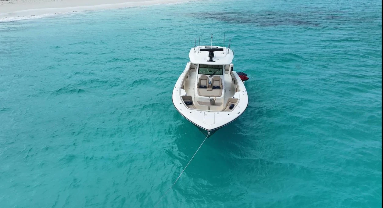 a boat in the water aboard SCOUT 400LXF Yacht for Sale