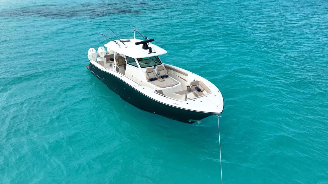 a boat in the water aboard SCOUT 400LXF Yacht for Sale
