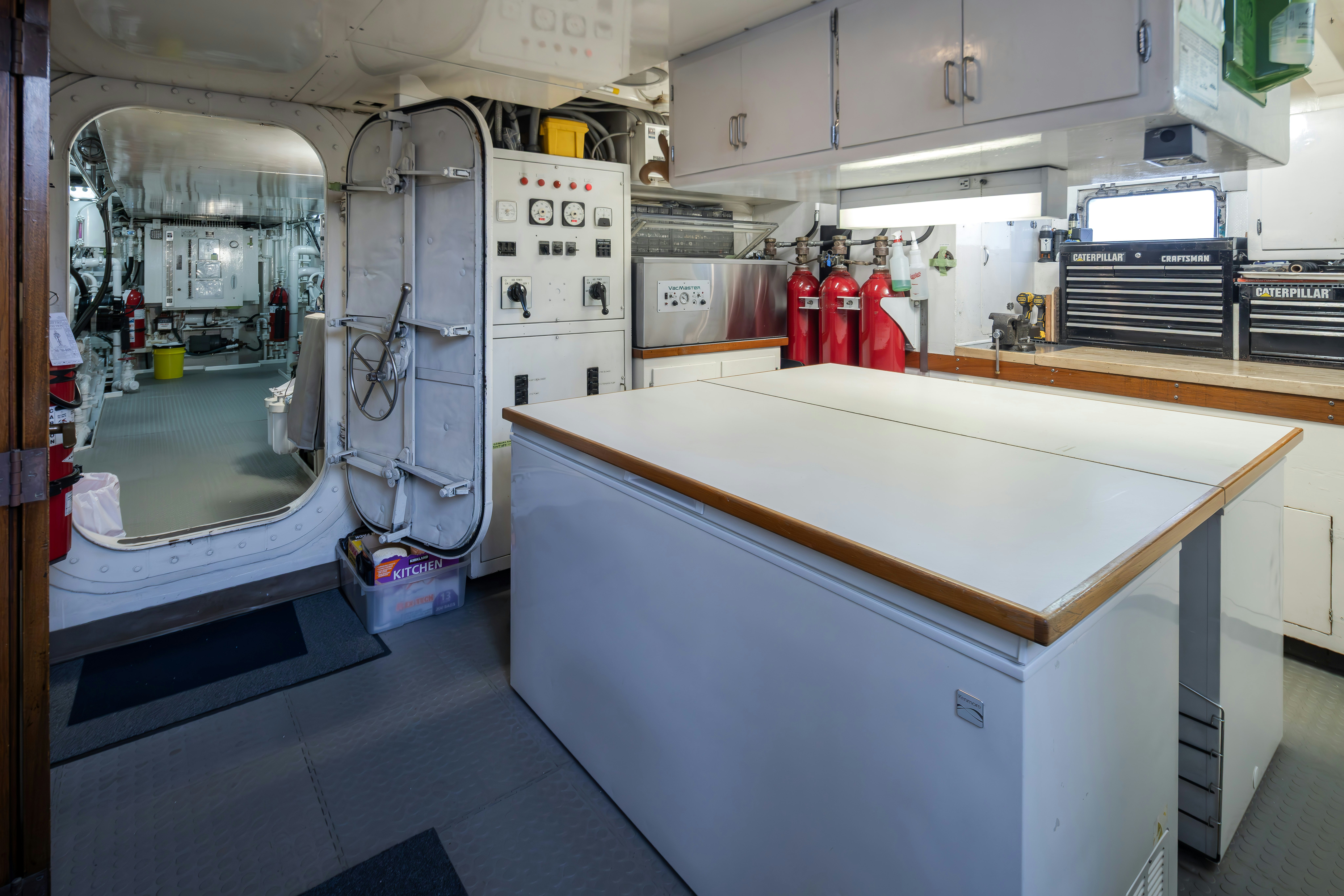 a large industrial machine aboard SILVERADO Yacht for Sale