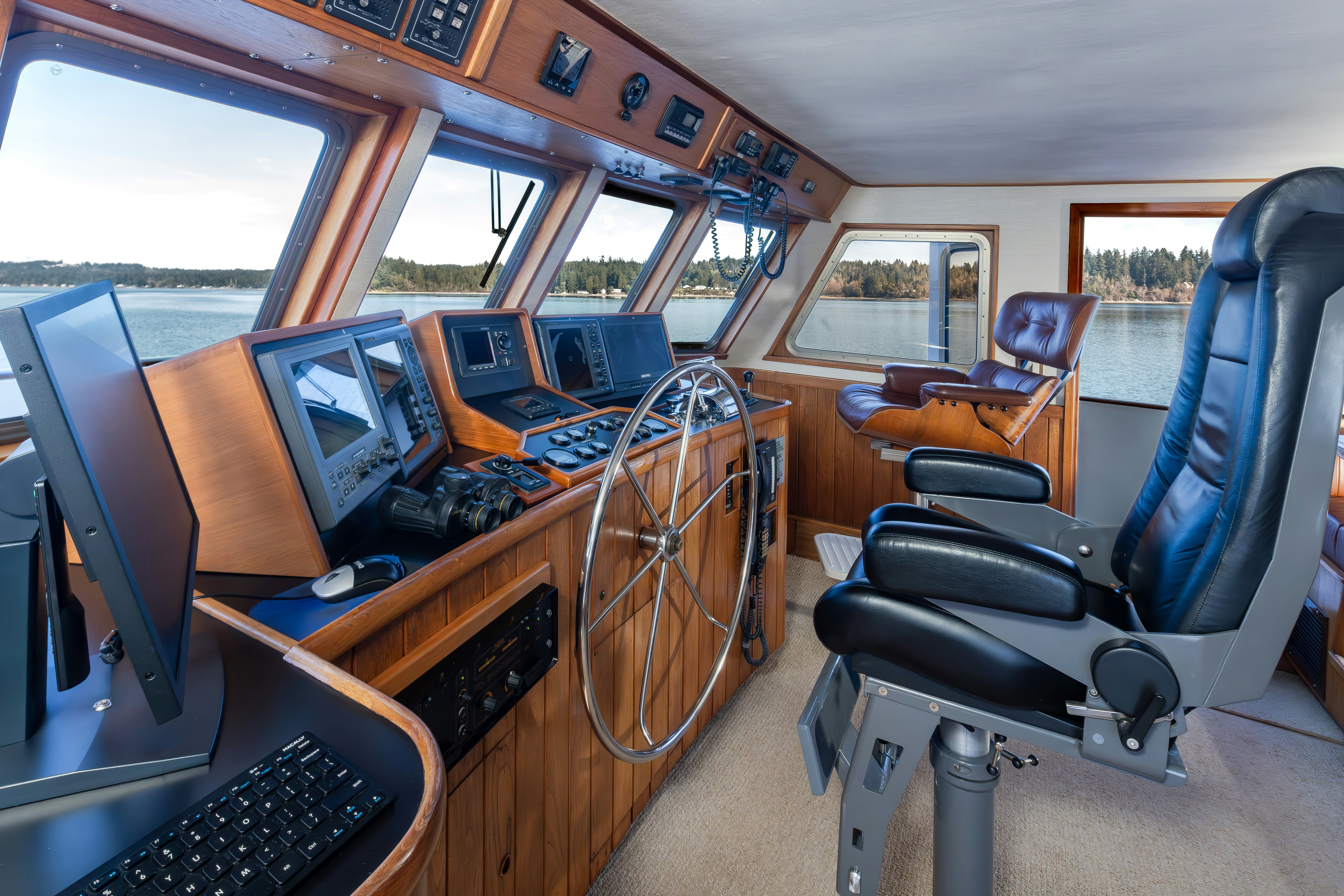 a vehicle with computers and monitors aboard SILVERADO Yacht for Sale