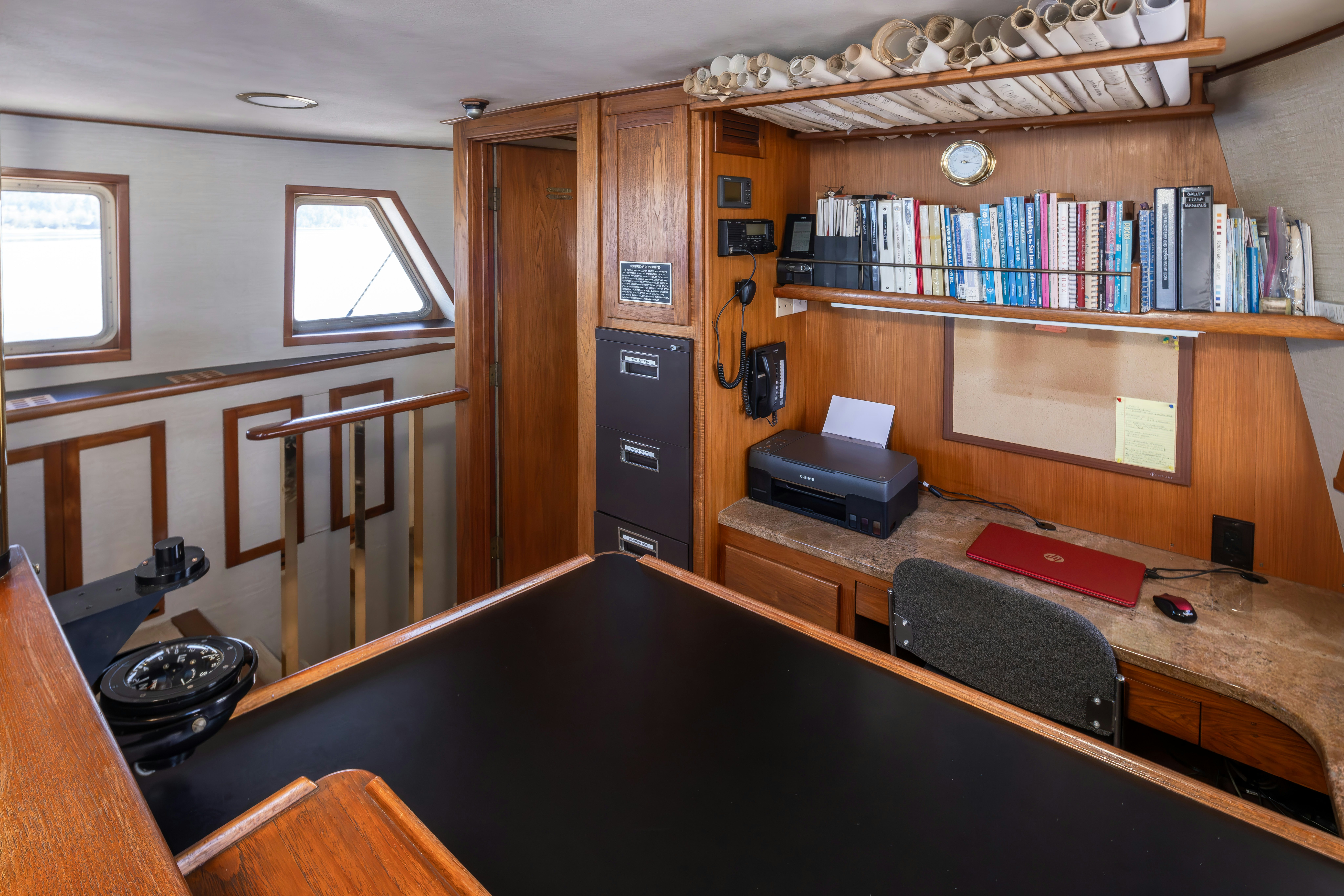 a room with a desk and a computer aboard SILVERADO Yacht for Sale