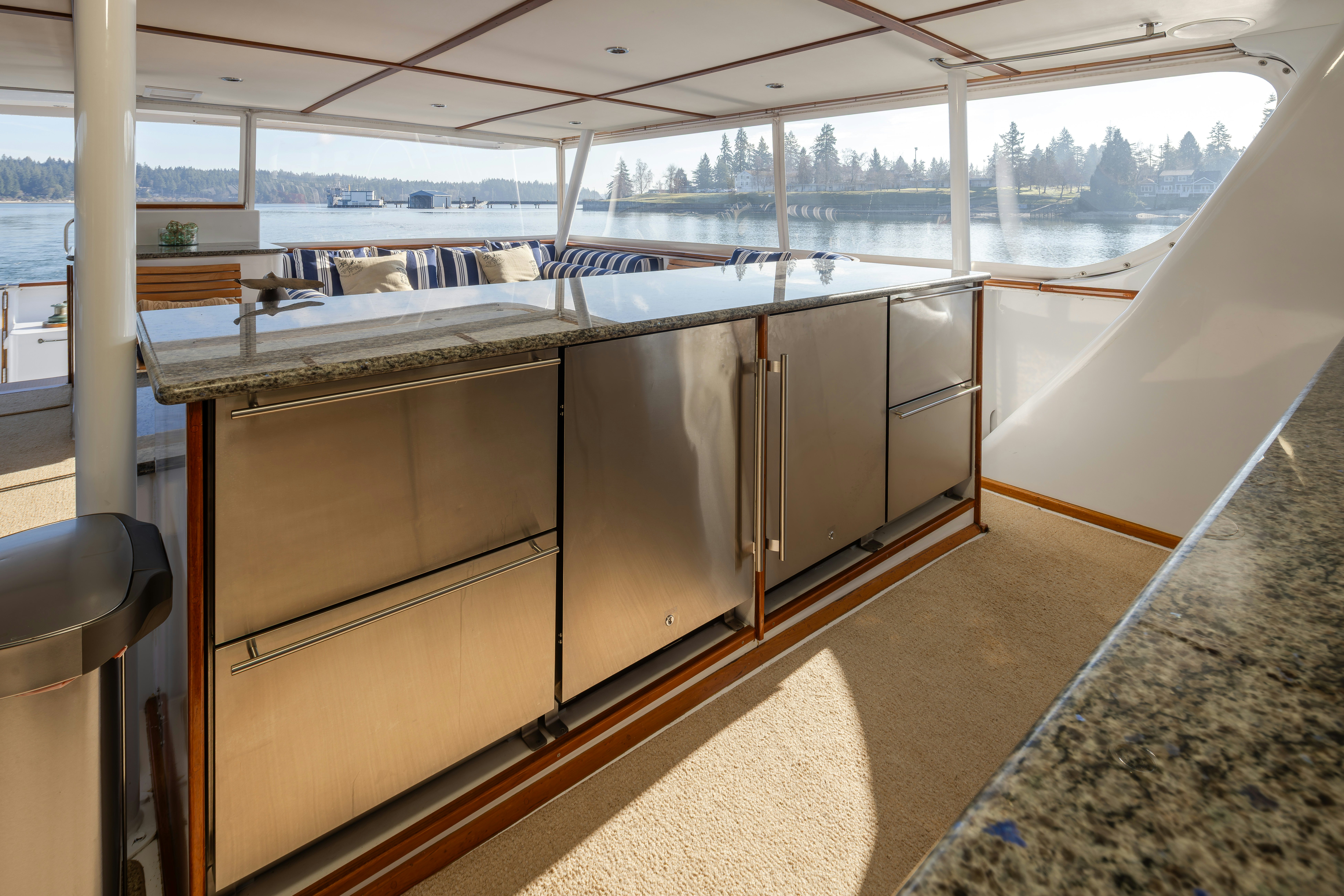 a large kitchen with a large window aboard SILVERADO Yacht for Sale