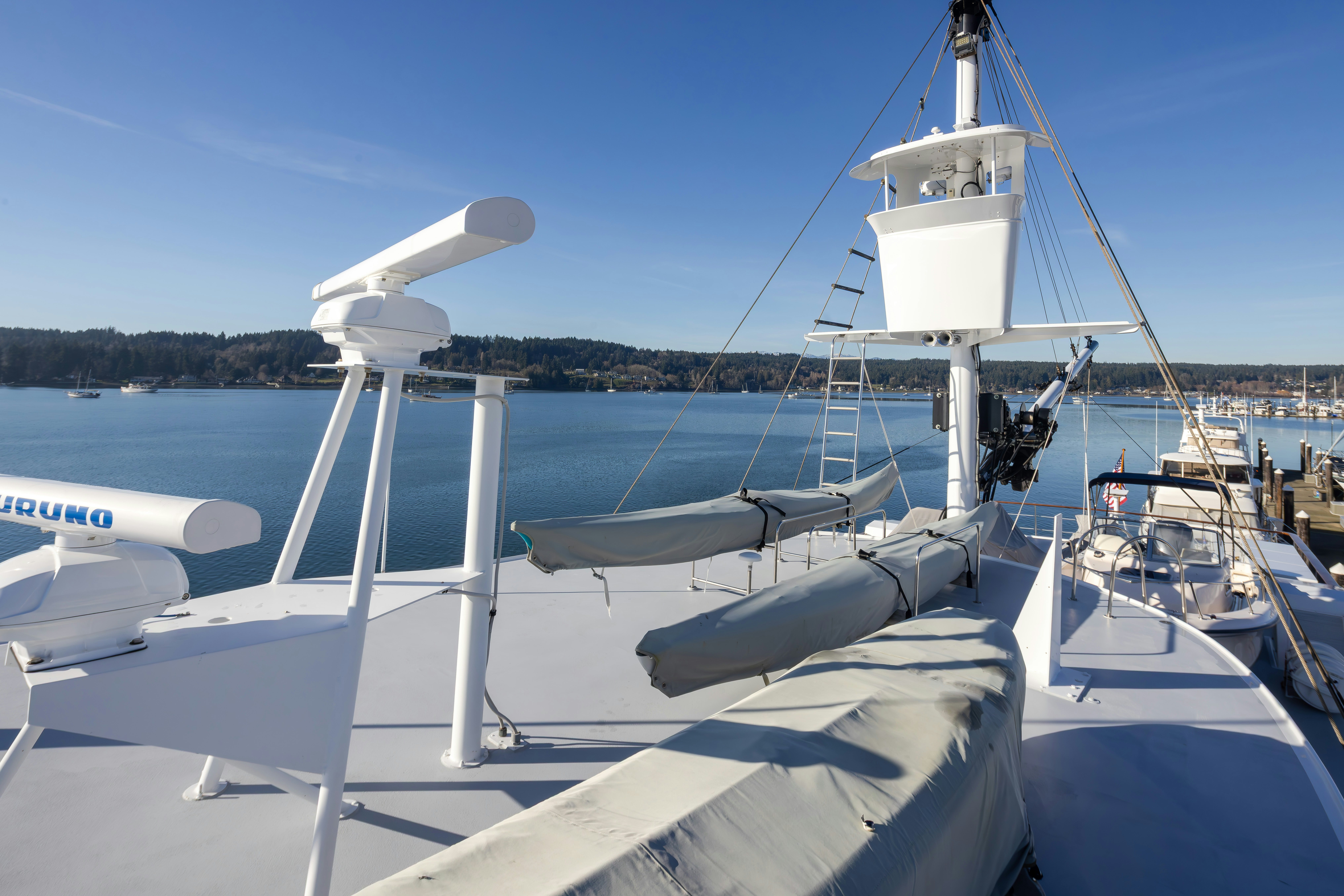 a boat with a satellite dish on it aboard SILVERADO Yacht for Sale