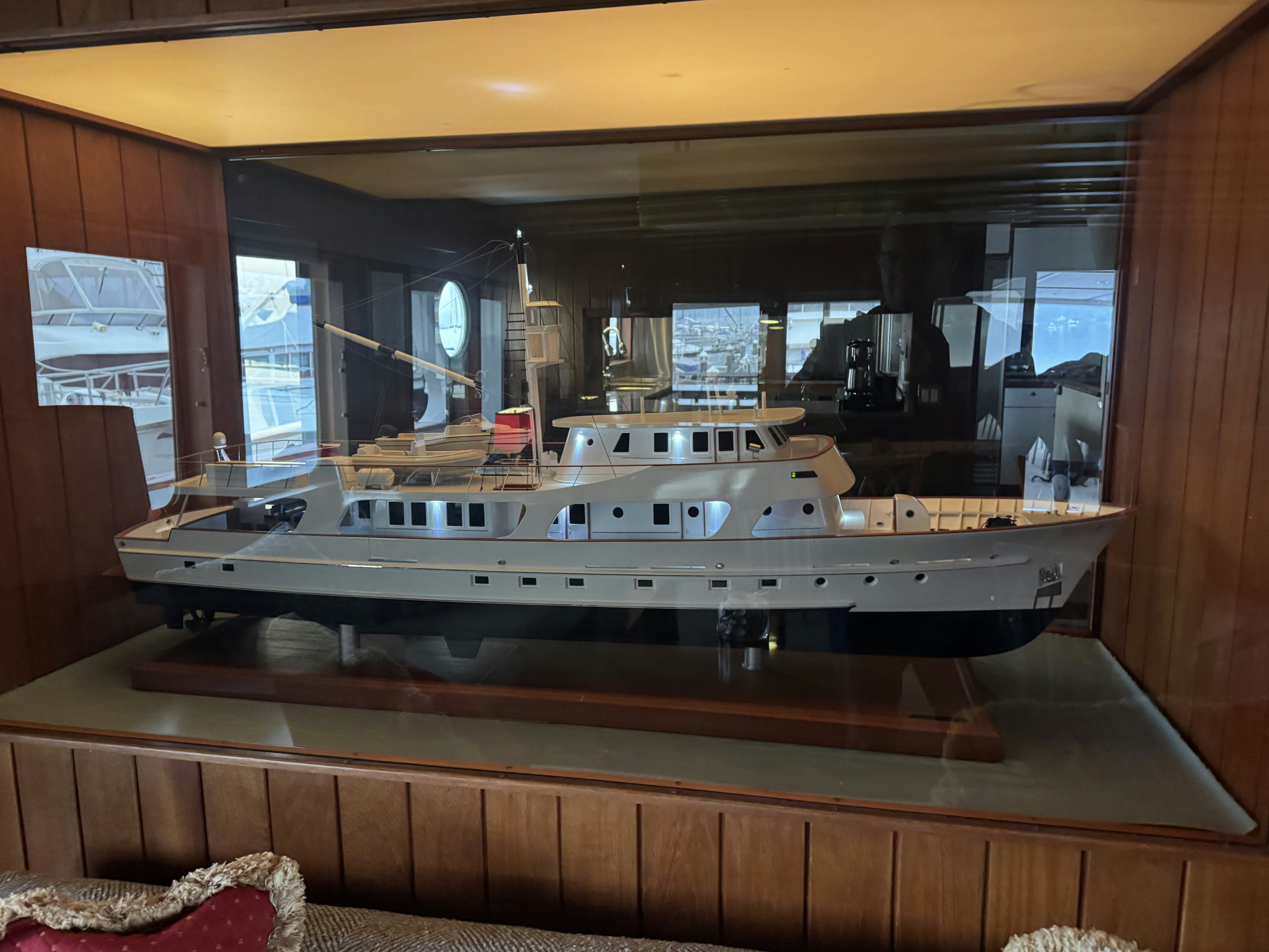 a large kitchen with a large mirror aboard SILVERADO Yacht for Sale