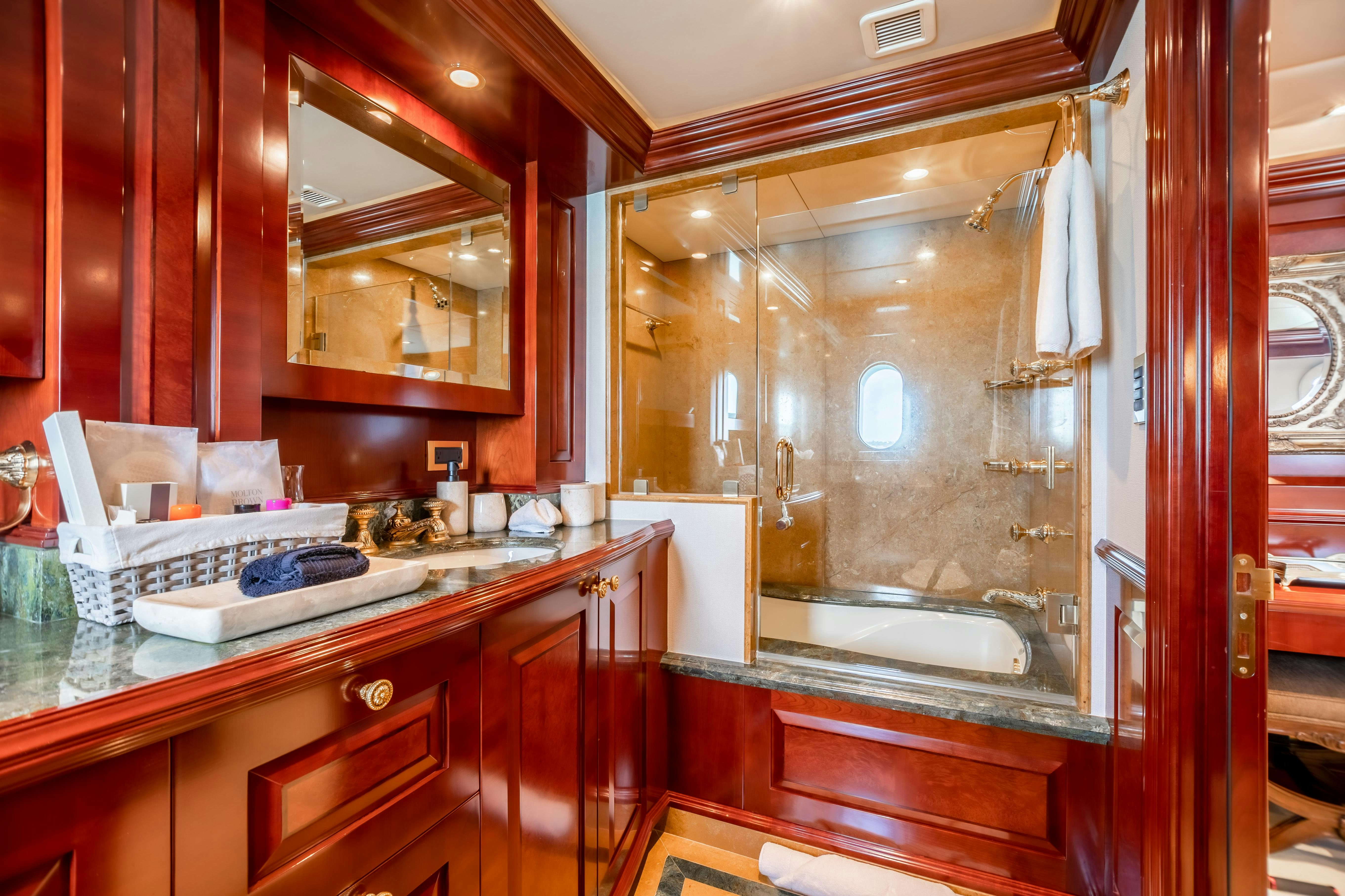 a kitchen with wooden cabinets aboard MISS STEPHANIE Yacht for Charter