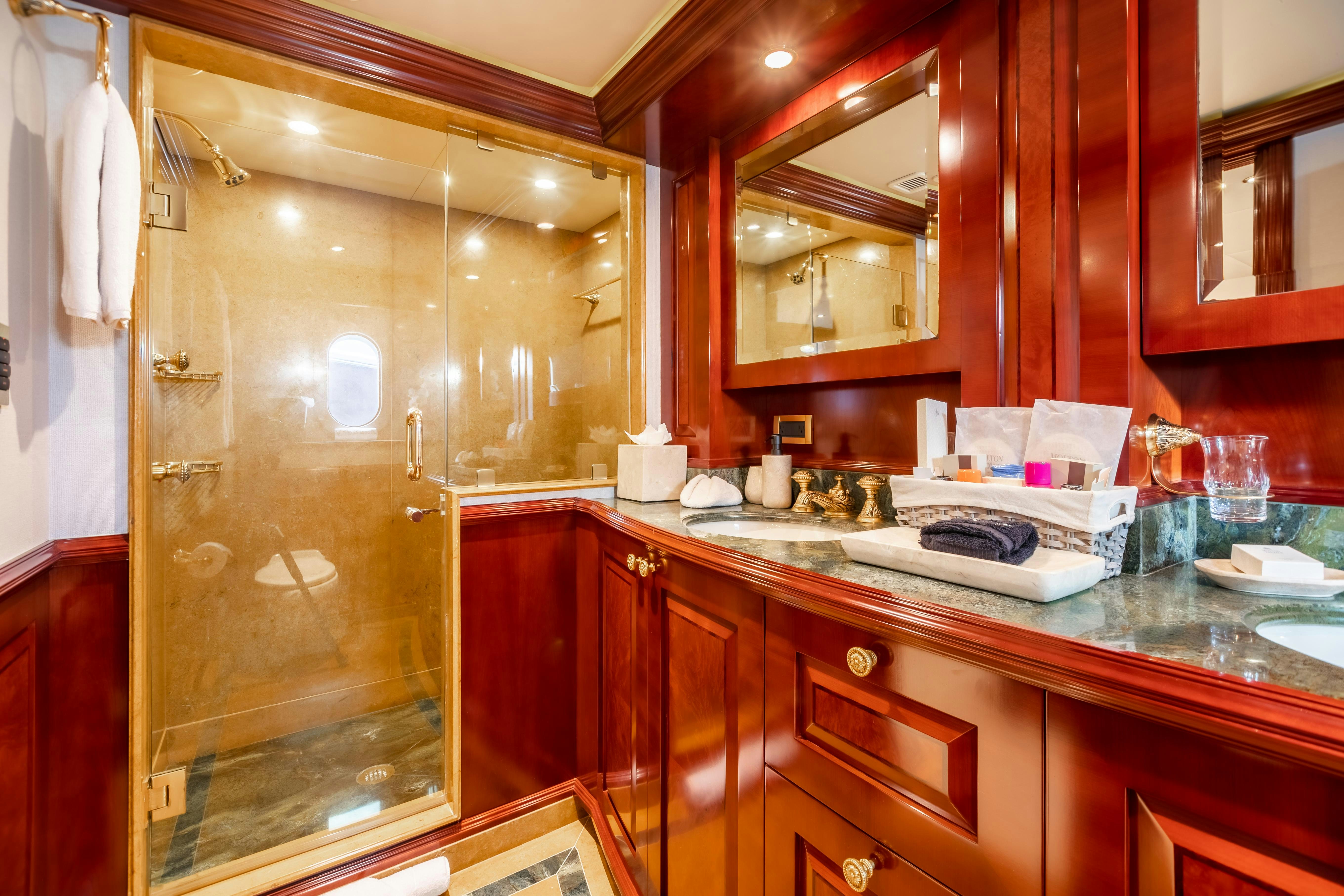 a kitchen with wooden cabinets aboard MISS STEPHANIE Yacht for Charter