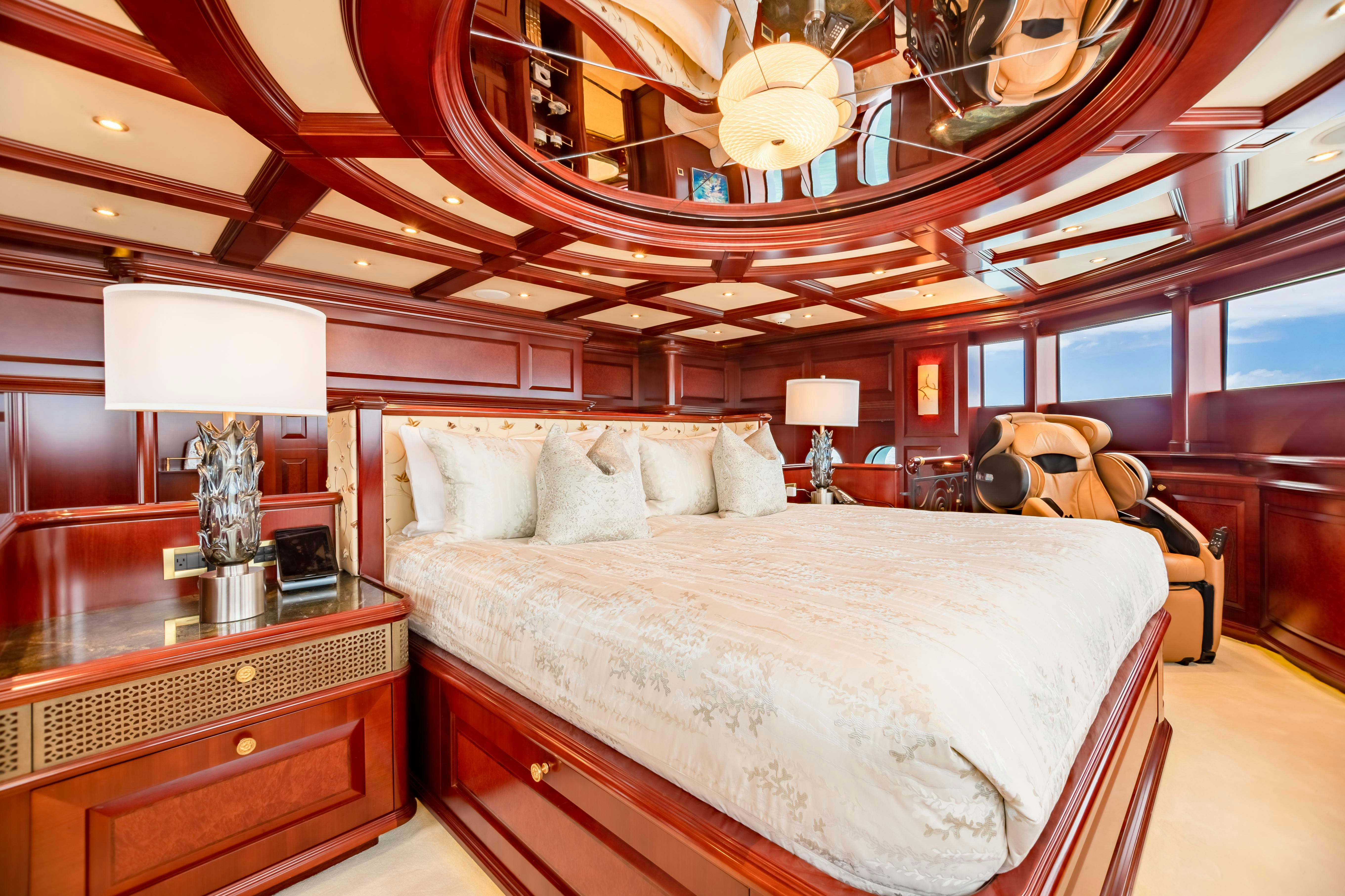 a bedroom with a large bed aboard MISS STEPHANIE Yacht for Charter