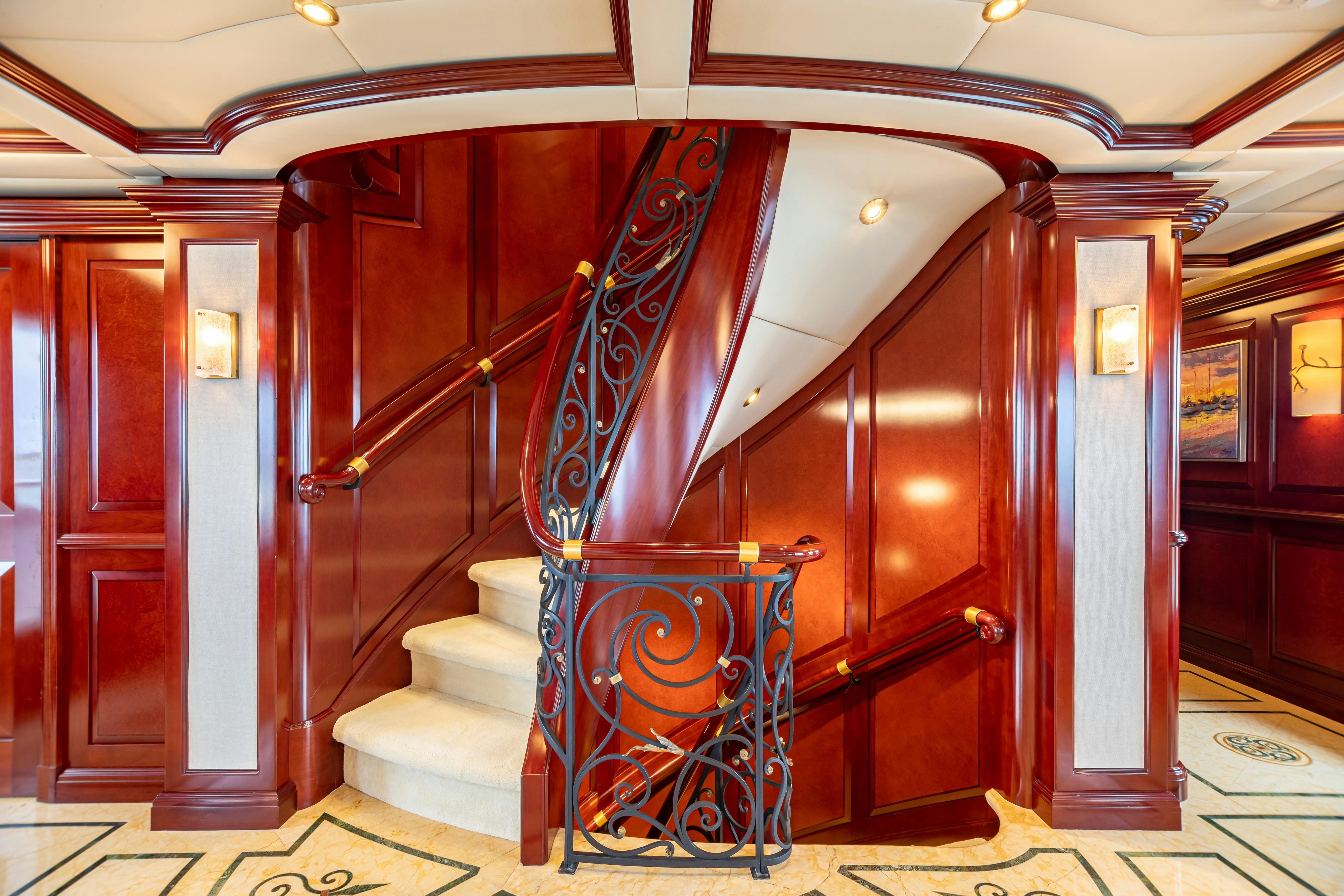 a large metal staircase in a building aboard MISS STEPHANIE Yacht for Charter