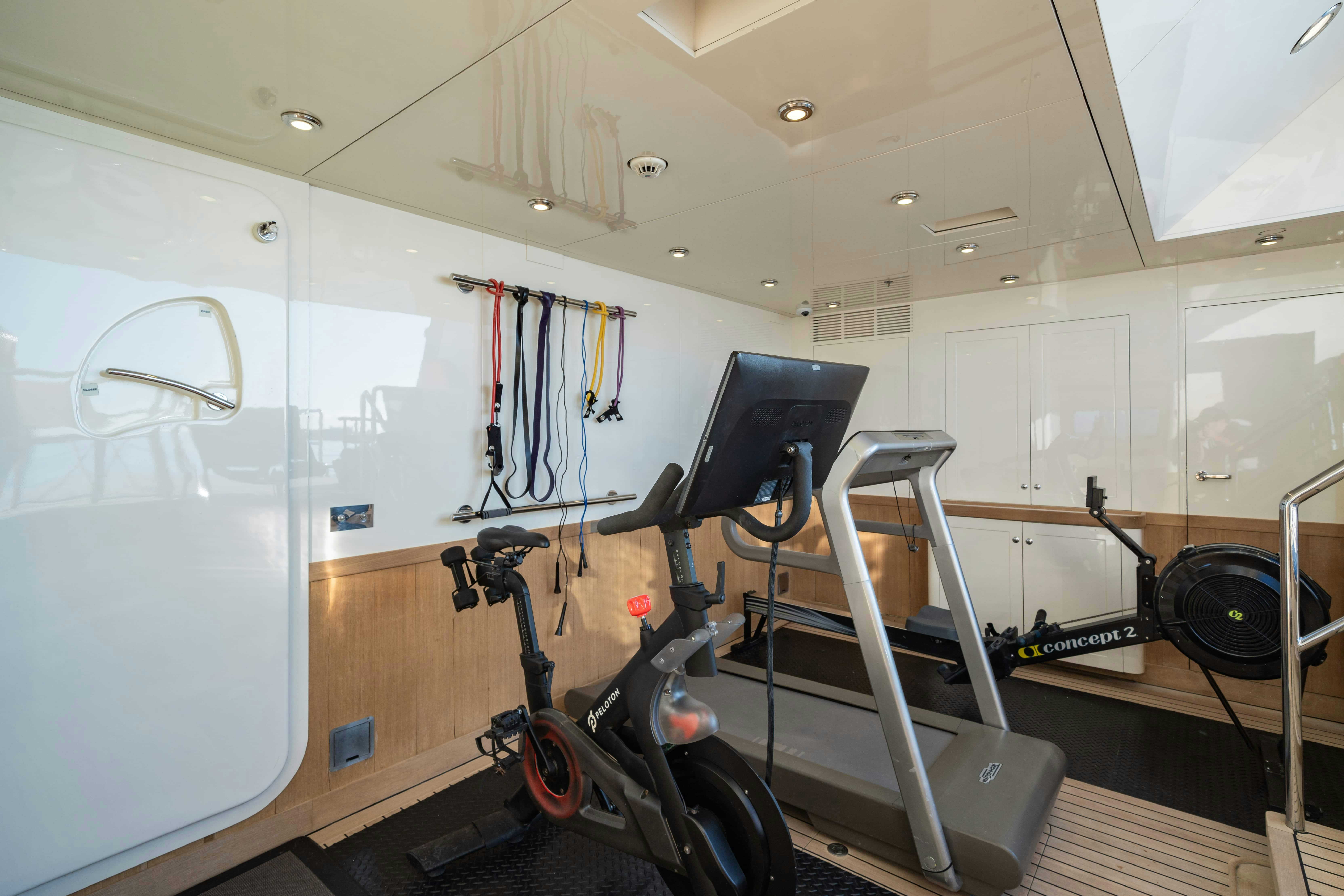 a room with exercise equipment aboard FABULOUS CHARACTER Yacht for Charter