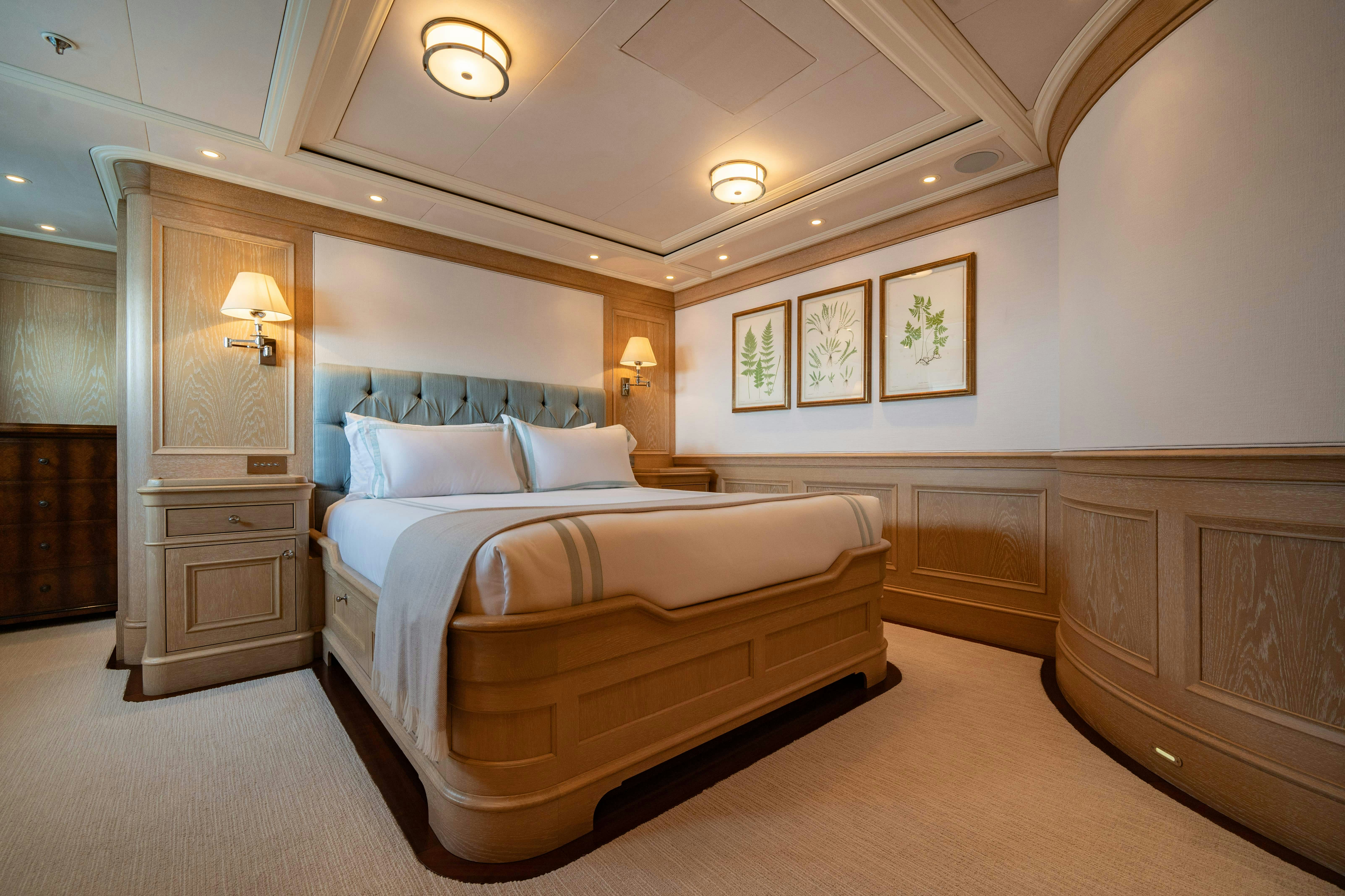 a large bedroom with a large bed aboard FABULOUS CHARACTER Yacht for Charter