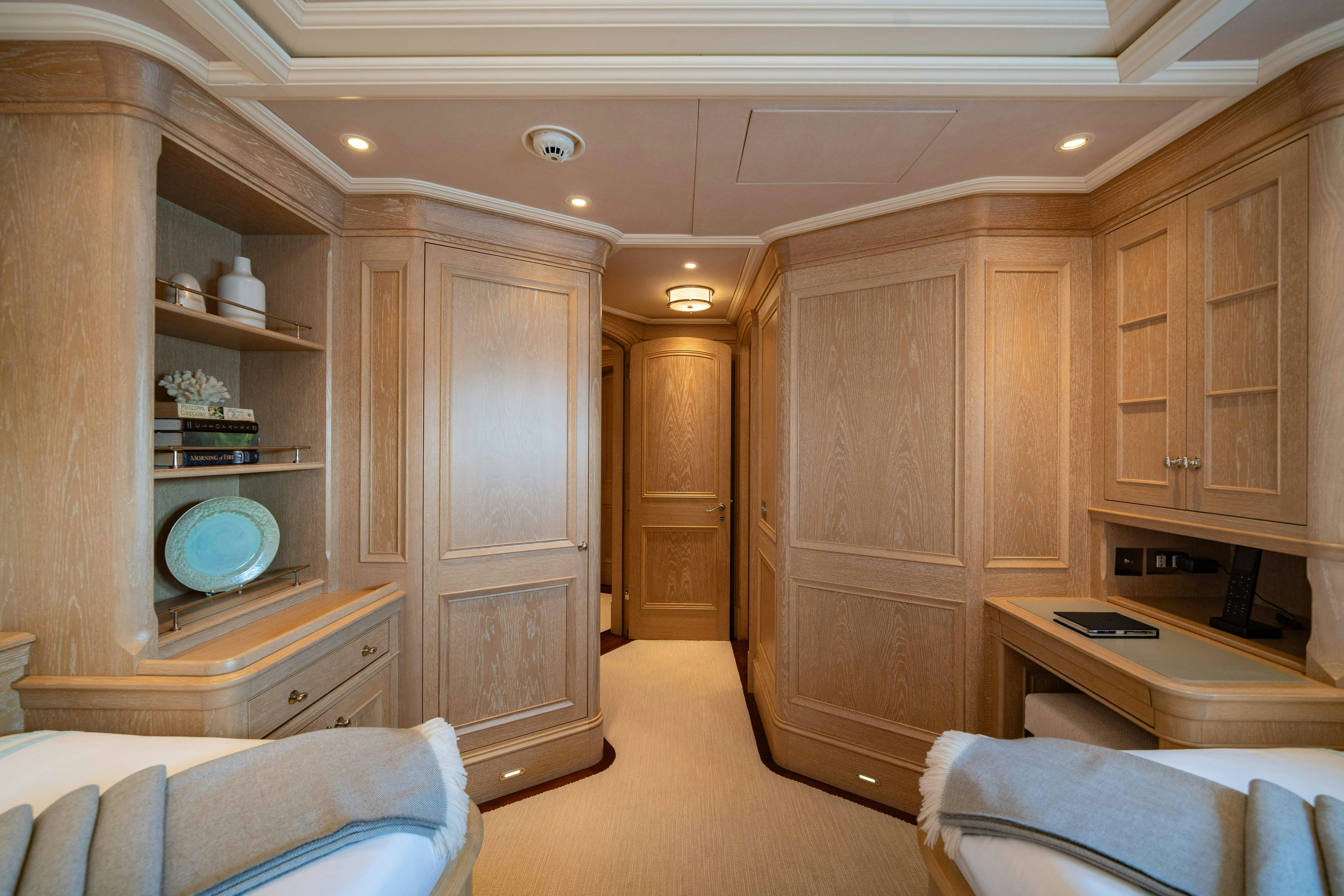 a room with wooden cabinets aboard FABULOUS CHARACTER Yacht for Charter