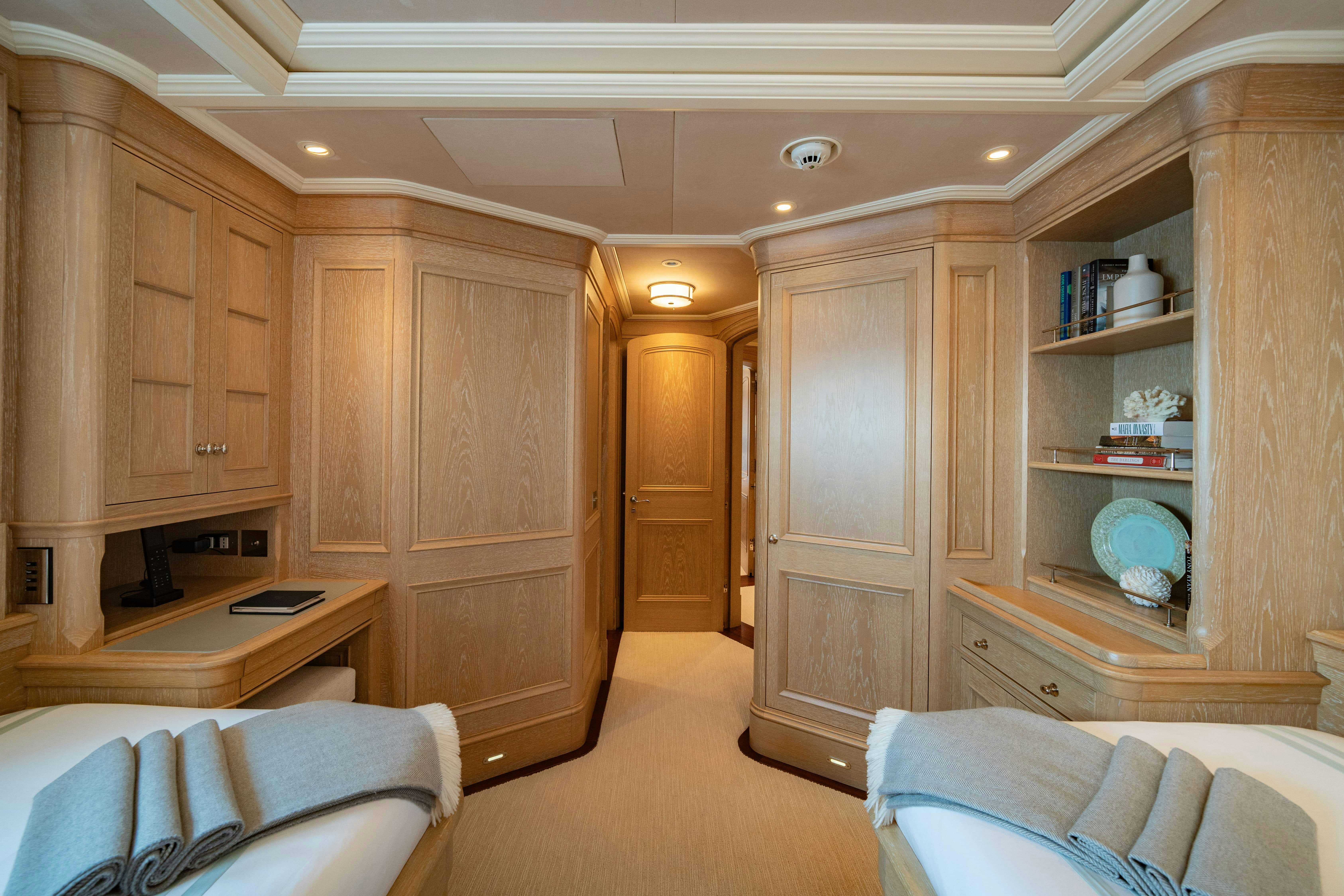 a room with wooden cabinets aboard FABULOUS CHARACTER Yacht for Charter