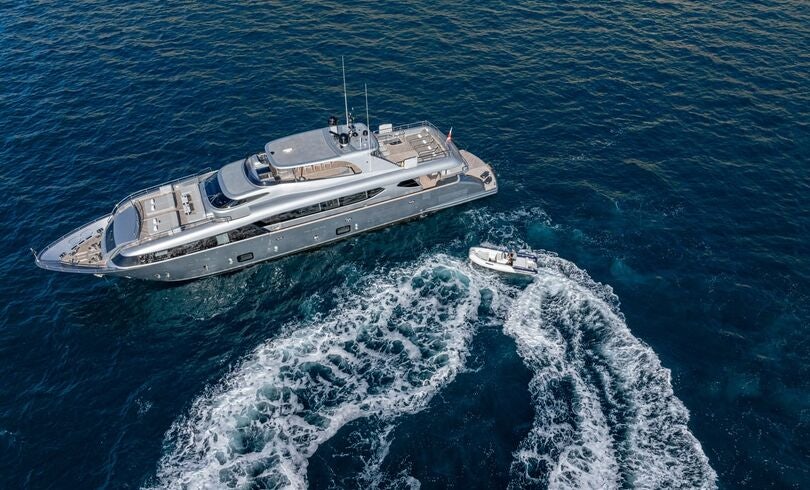 a ship in the ocean aboard SANDS Yacht for Charter