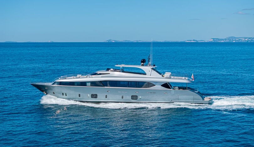 a white yacht in the water aboard SANDS Yacht for Charter