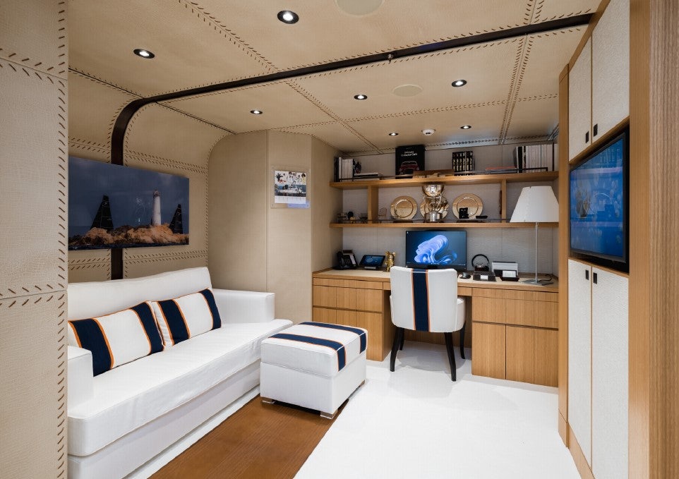 a room with a bed and a desk aboard VENTUM MARIS Yacht for Sale