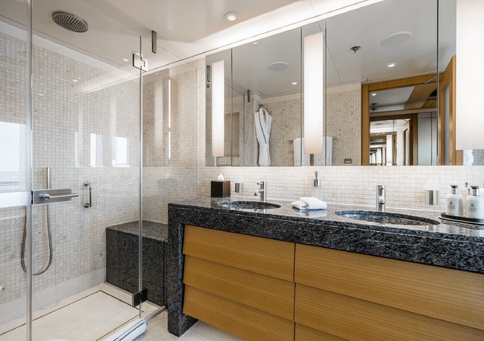 a bathroom with a glass shower aboard VENTUM MARIS Yacht for Sale