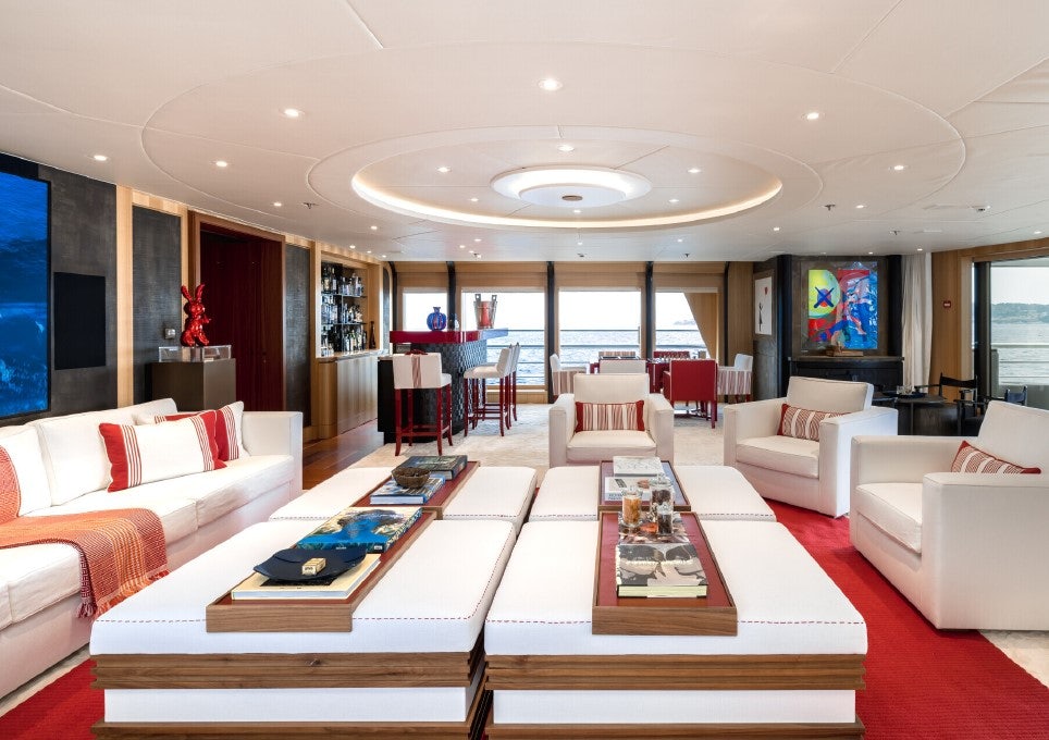 a living room with a large screen aboard VENTUM MARIS Yacht for Sale