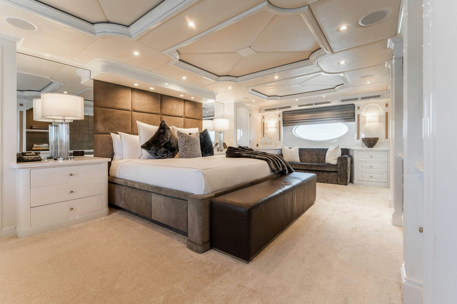 a large bedroom with a large bed aboard NICOLE EVELYN Yacht for Charter