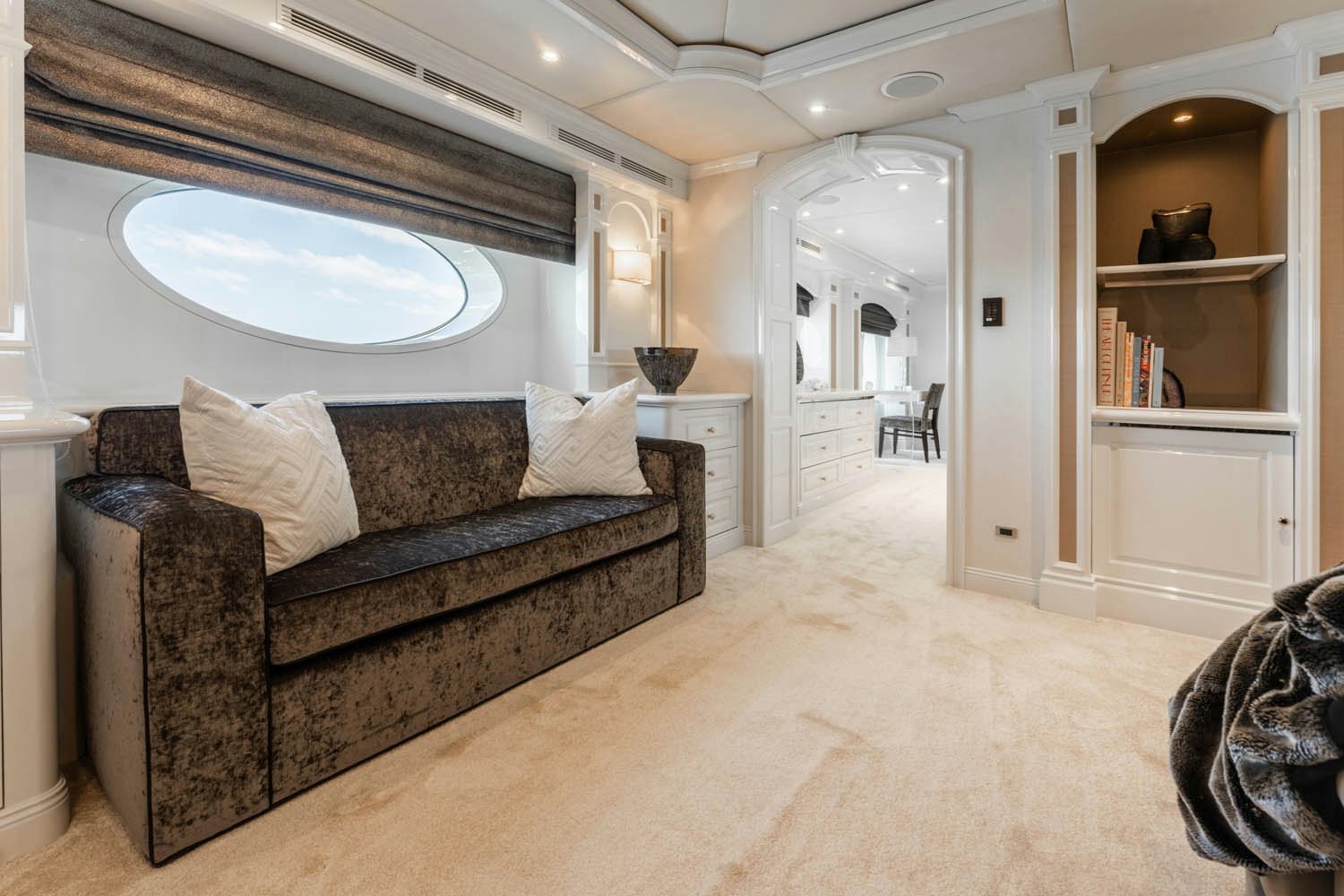 a large living room with a couch aboard NICOLE EVELYN Yacht for Charter