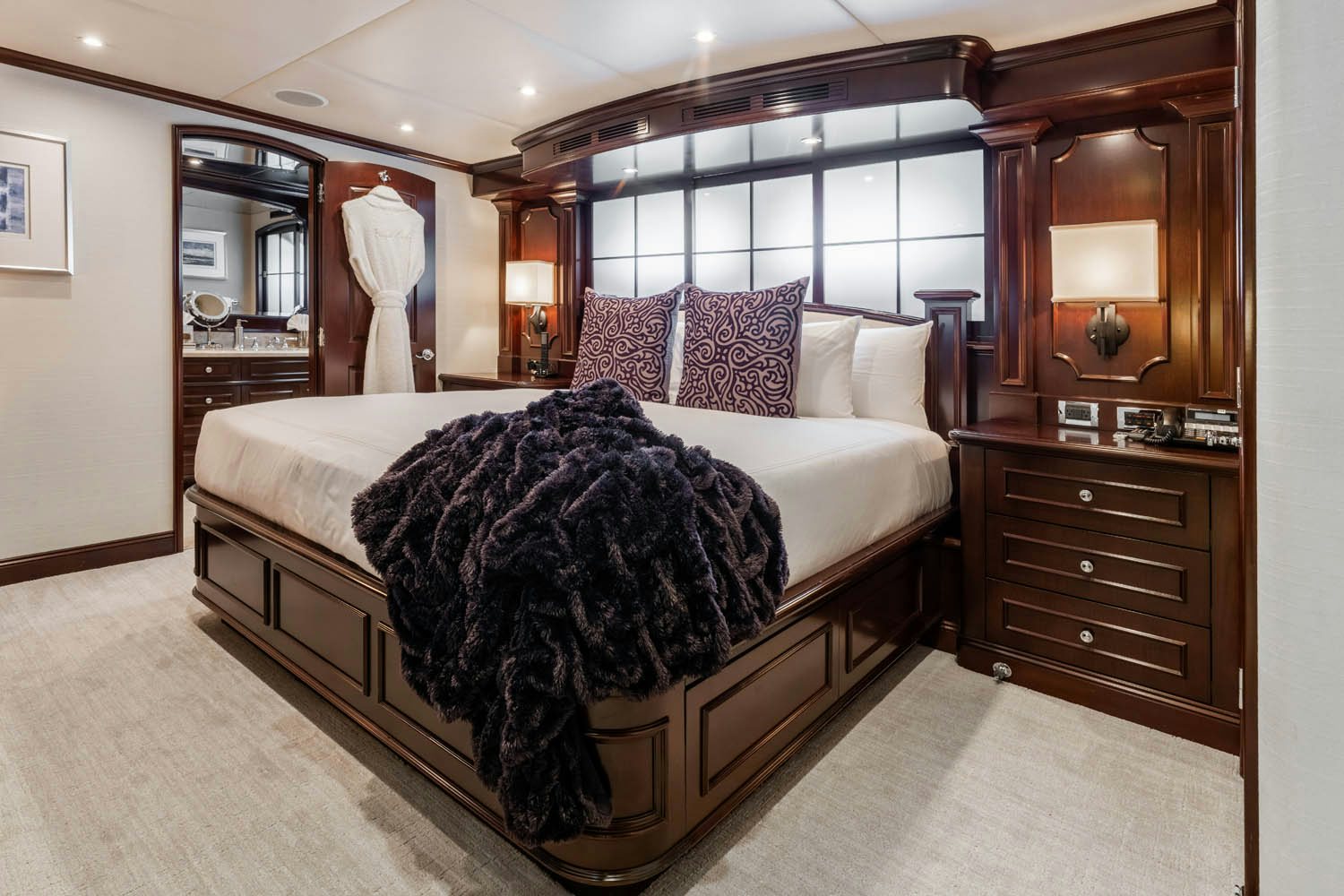 a large bed in a room aboard NICOLE EVELYN Yacht for Charter