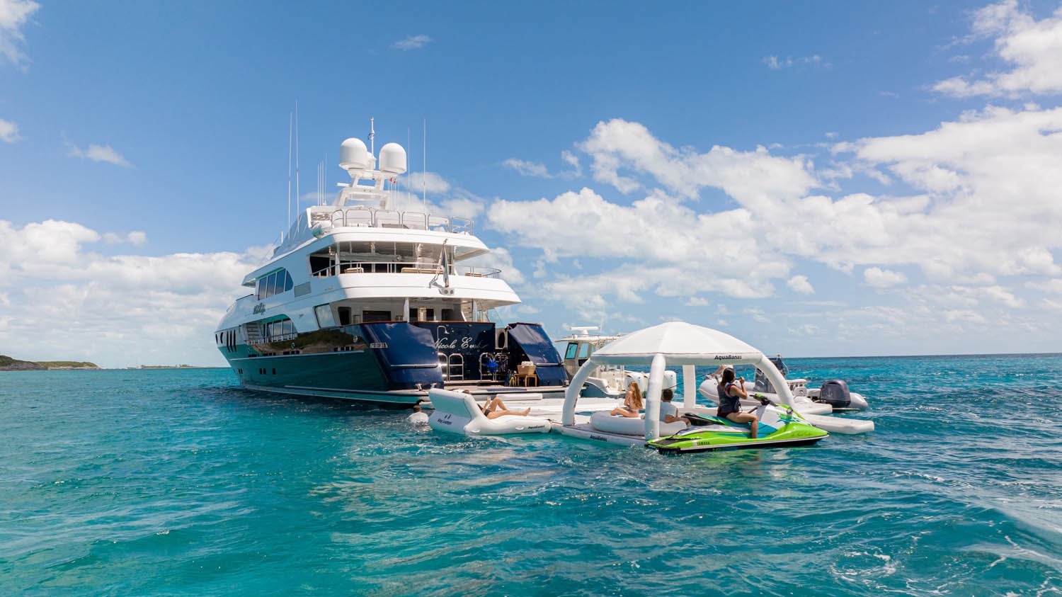 a boat with people on it aboard NICOLE EVELYN Yacht for Charter