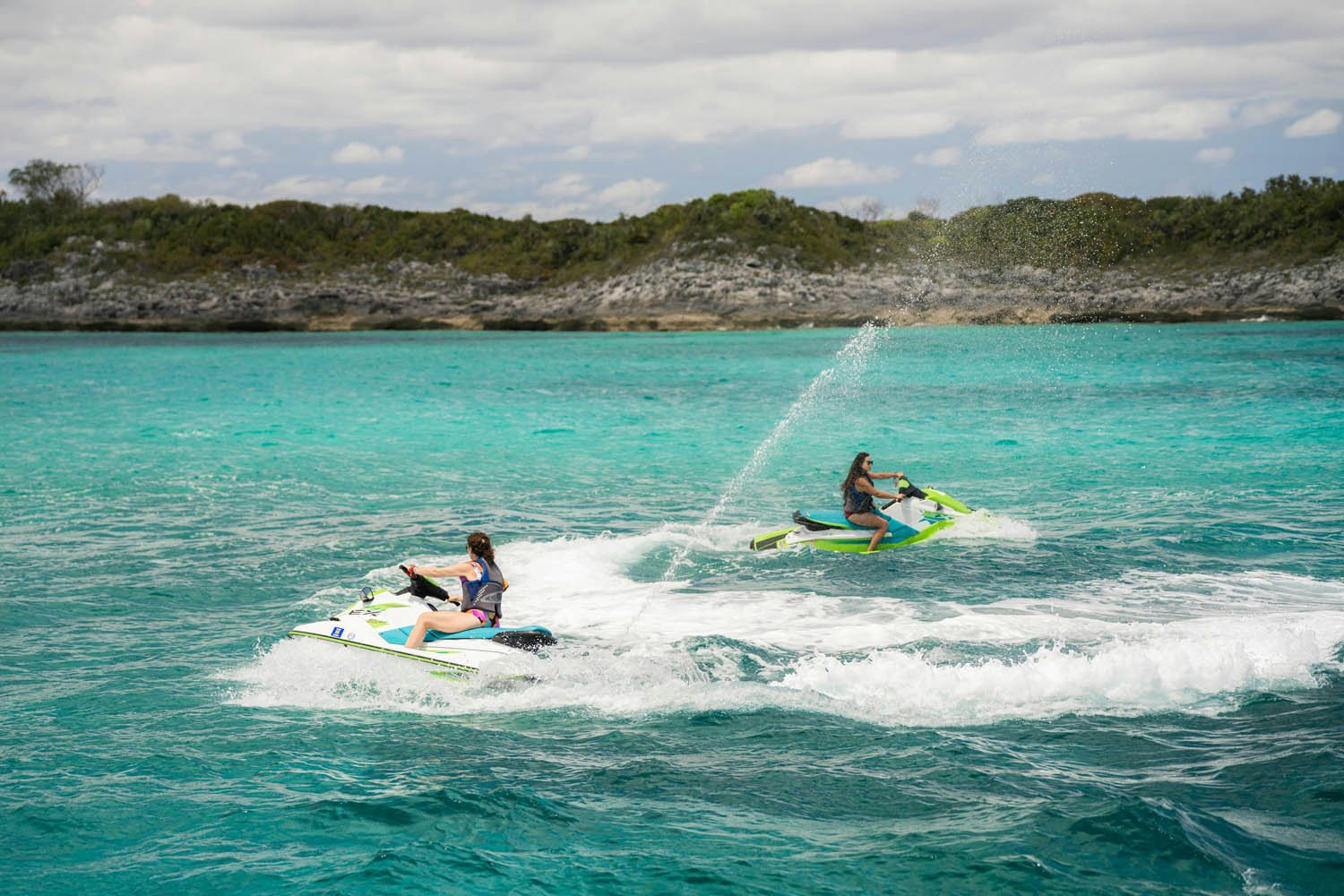 a group of people on surfboards in the water aboard NICOLE EVELYN Yacht for Charter