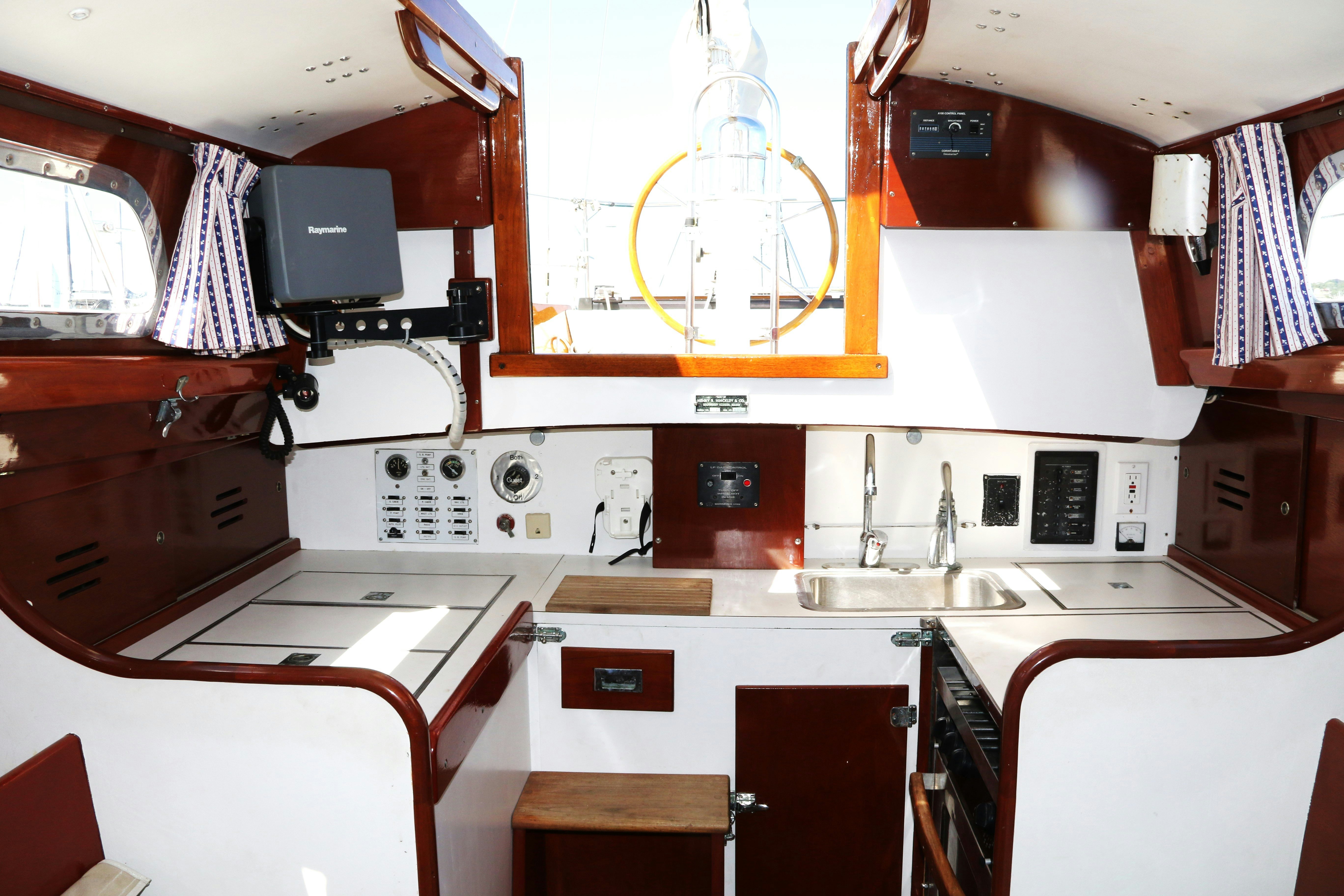 a kitchen with a window and a sink aboard ESOTERIC Yacht for Sale