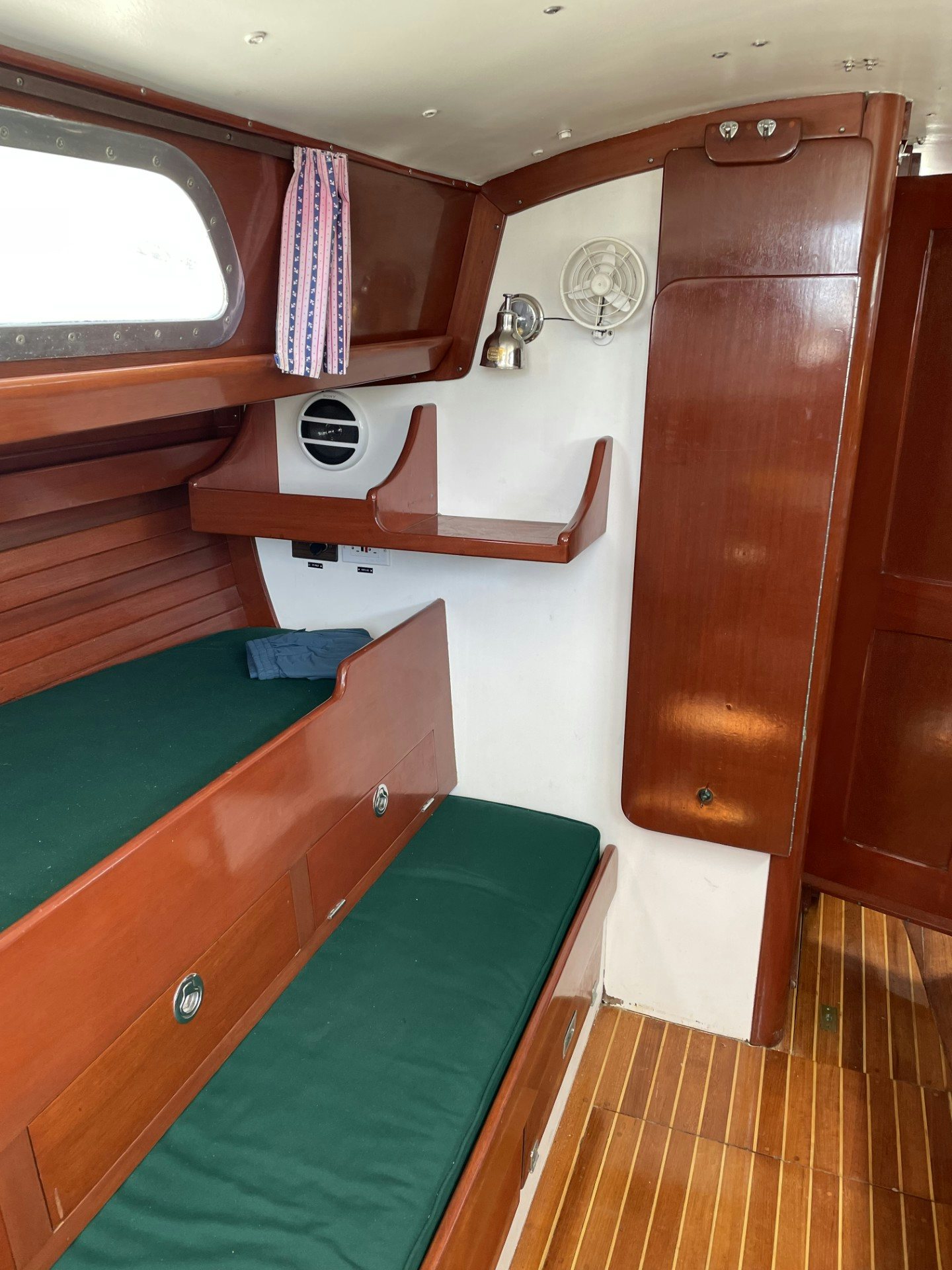 a small room with a bunk bed aboard ESOTERIC Yacht for Sale