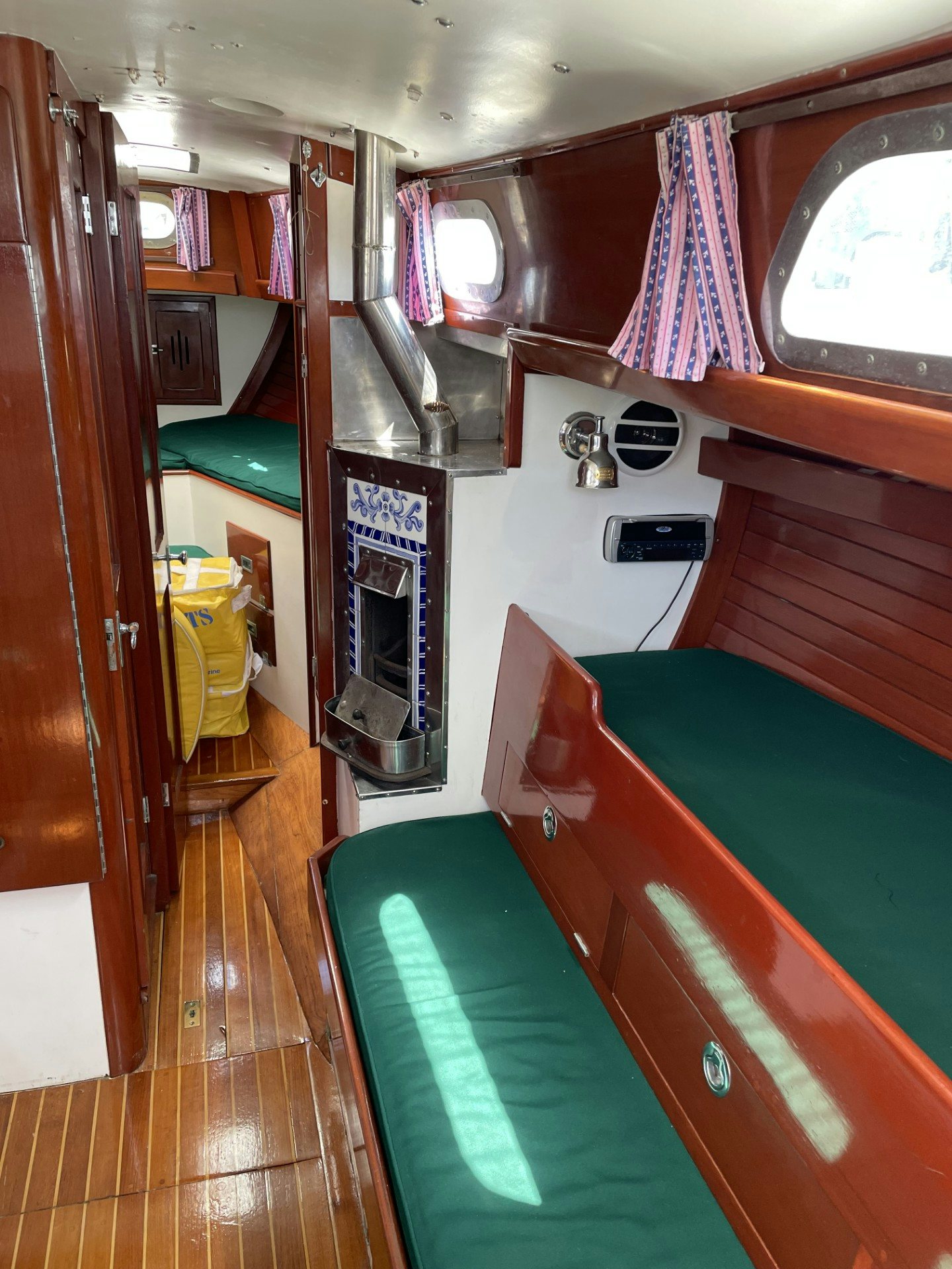 a room with a bed and a desk aboard ESOTERIC Yacht for Sale