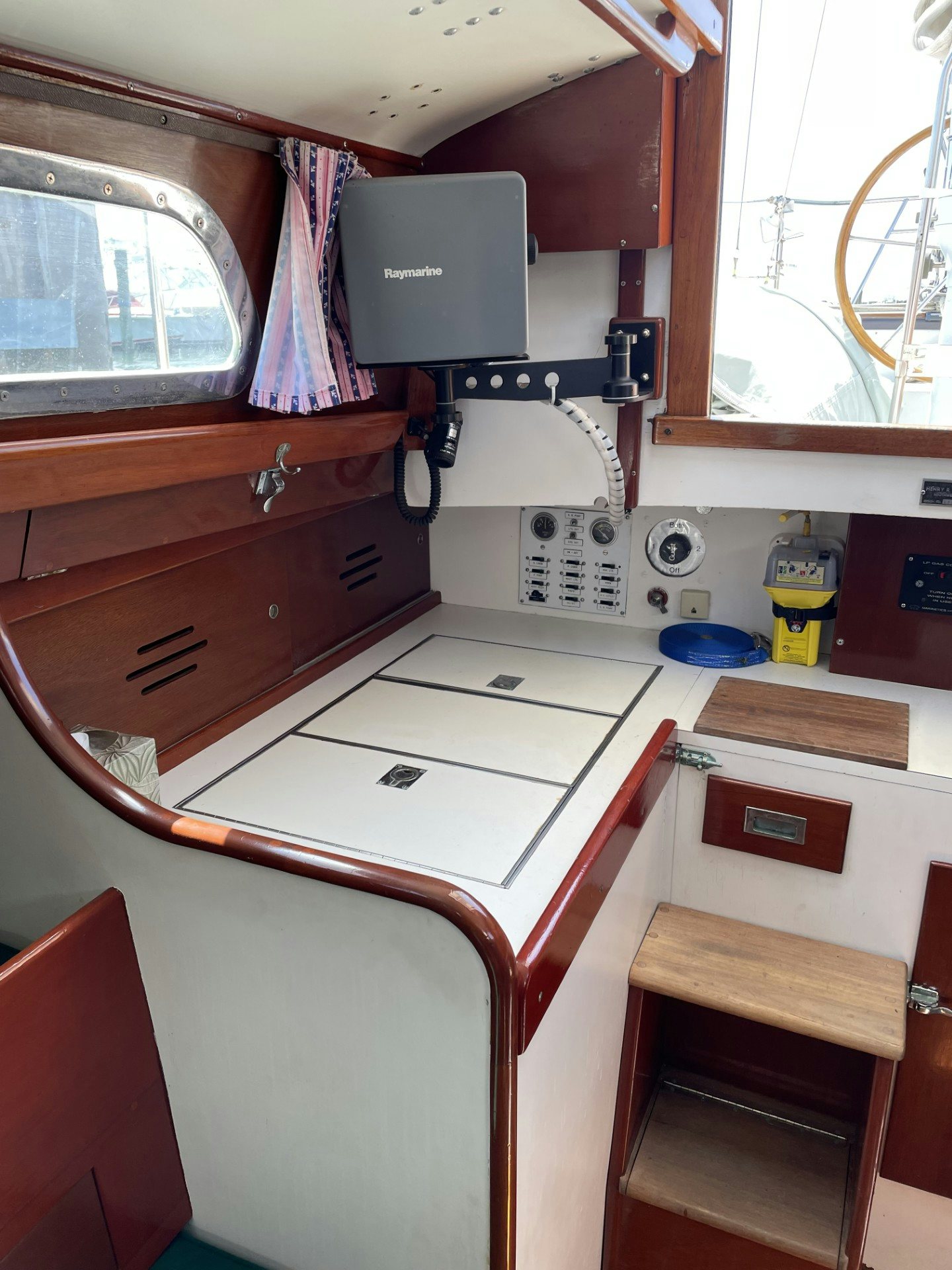 a kitchen with a microwave oven and cabinets aboard ESOTERIC Yacht for Sale