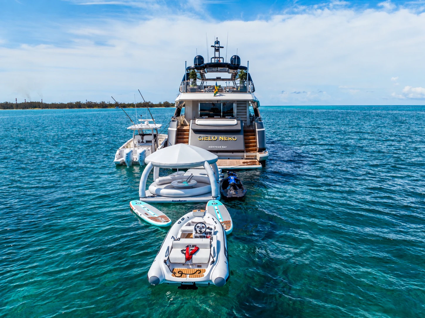 a group of boats in the water aboard CIELO NERO Yacht for Charter