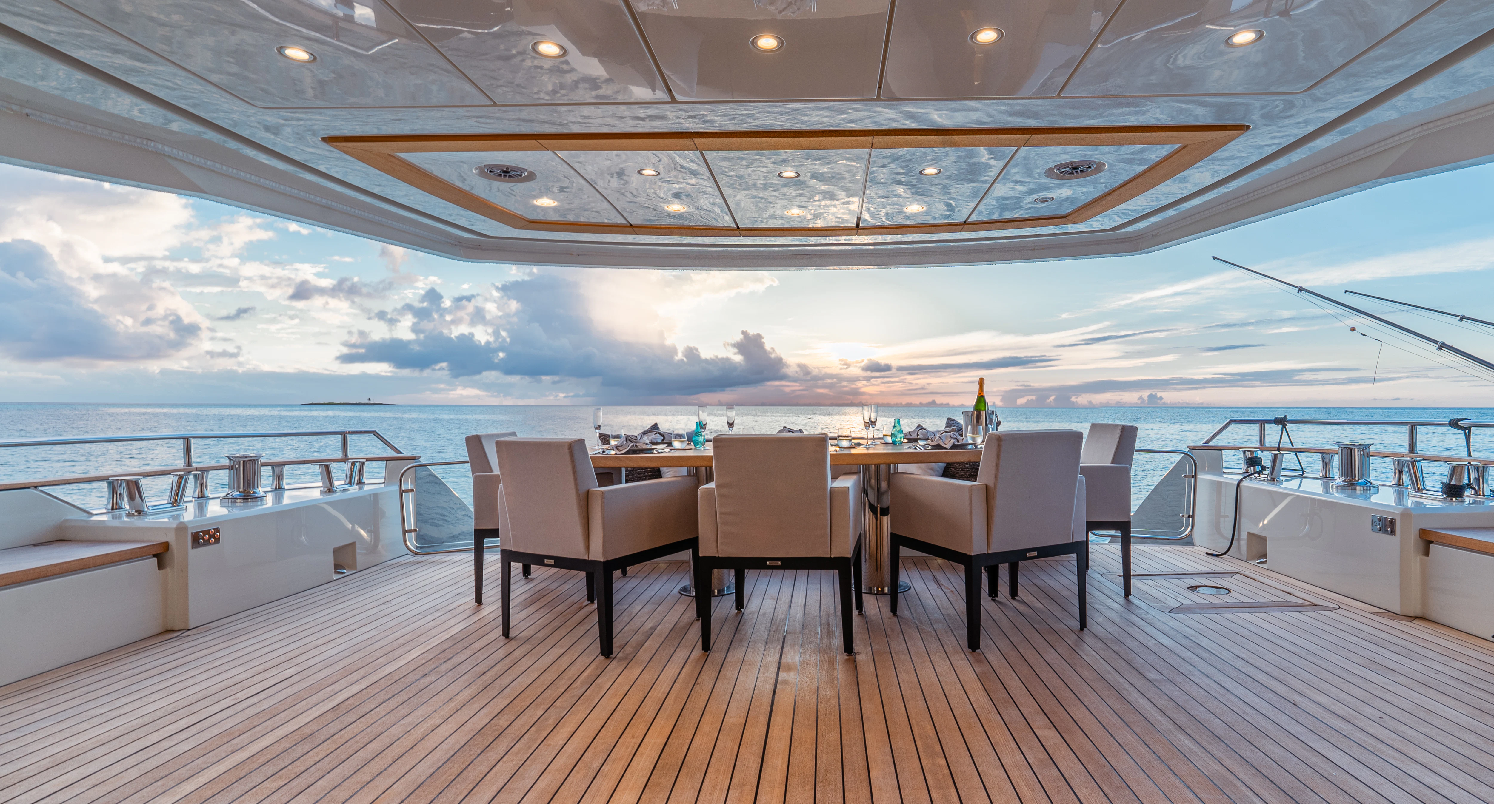 a room with a table and chairs aboard CIELO NERO Yacht for Charter