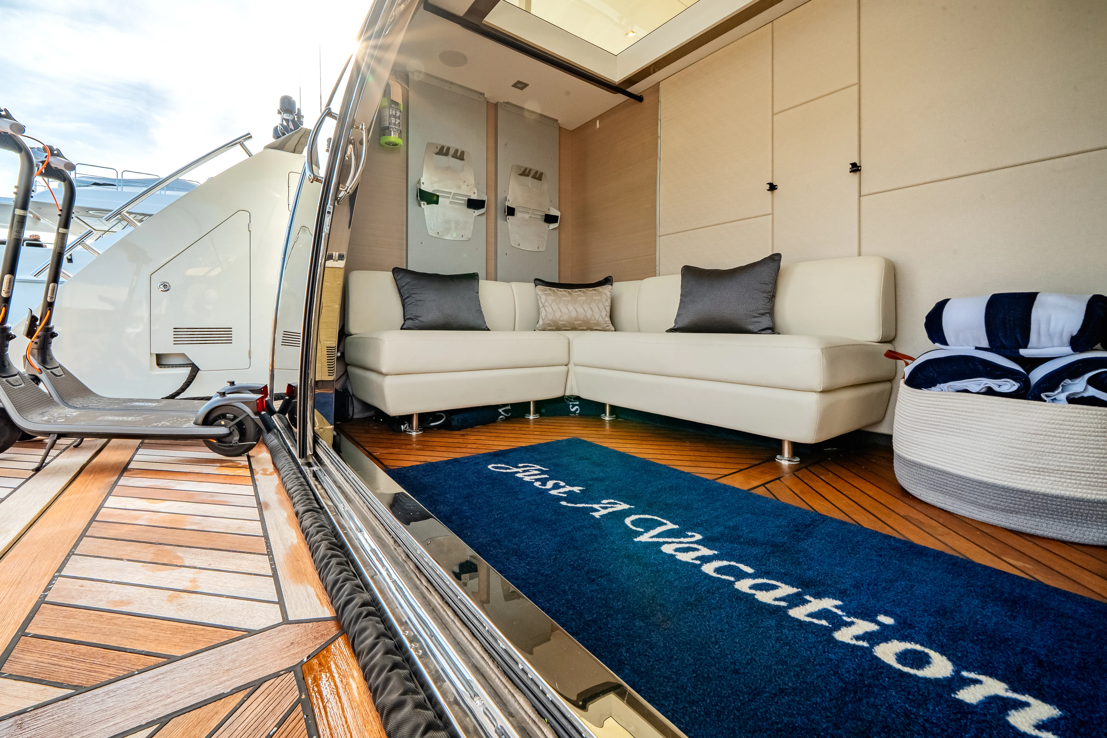 a living room with a couch and a rug aboard JUST A VACATION Yacht for Sale