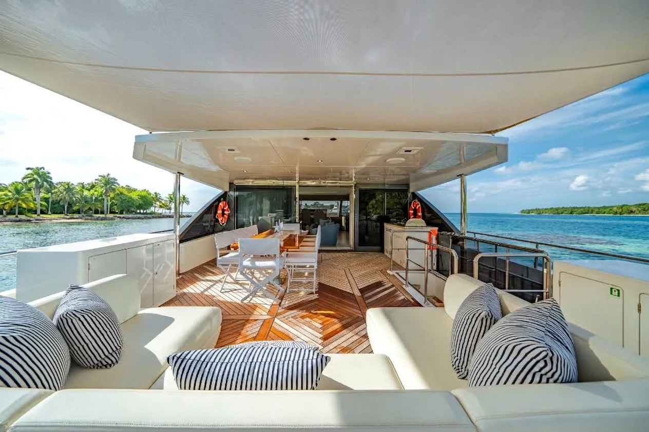 a room with a pool and a deck aboard JUST A VACATION Yacht for Sale